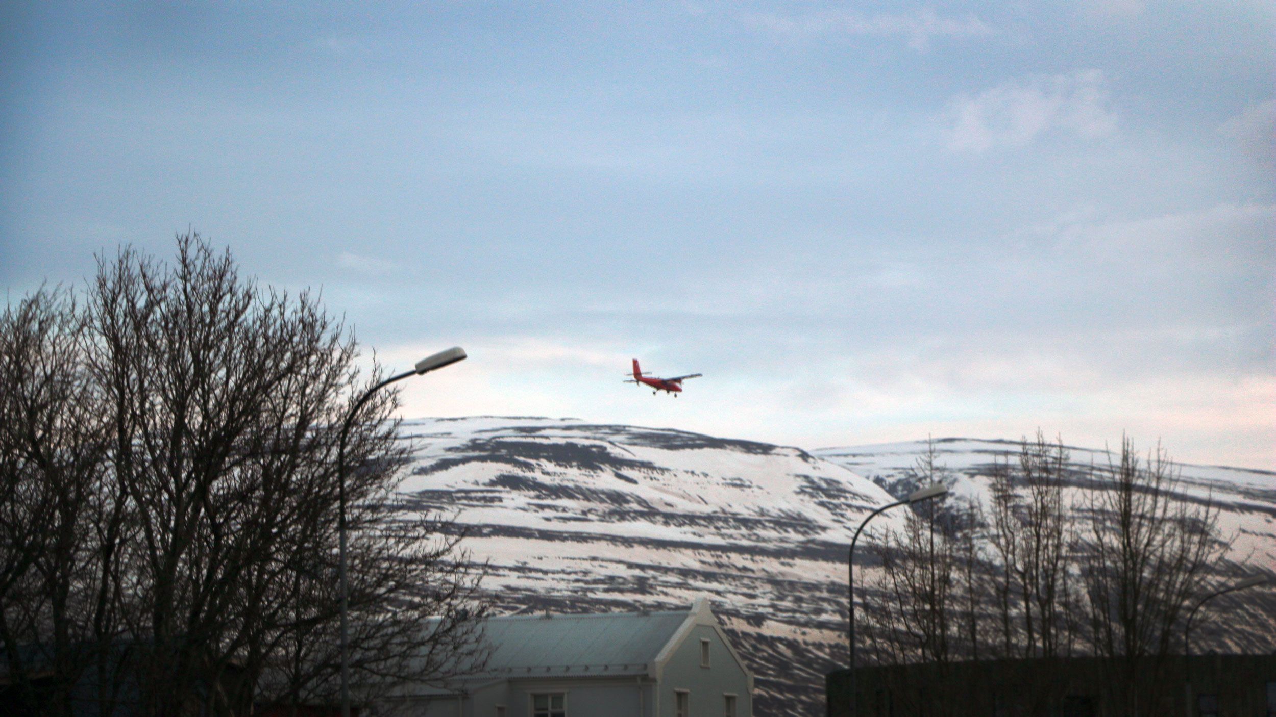 The Twin Otter aircraft above the Akureyri airport. Image by Ari Daniel. Iceland, 2018.