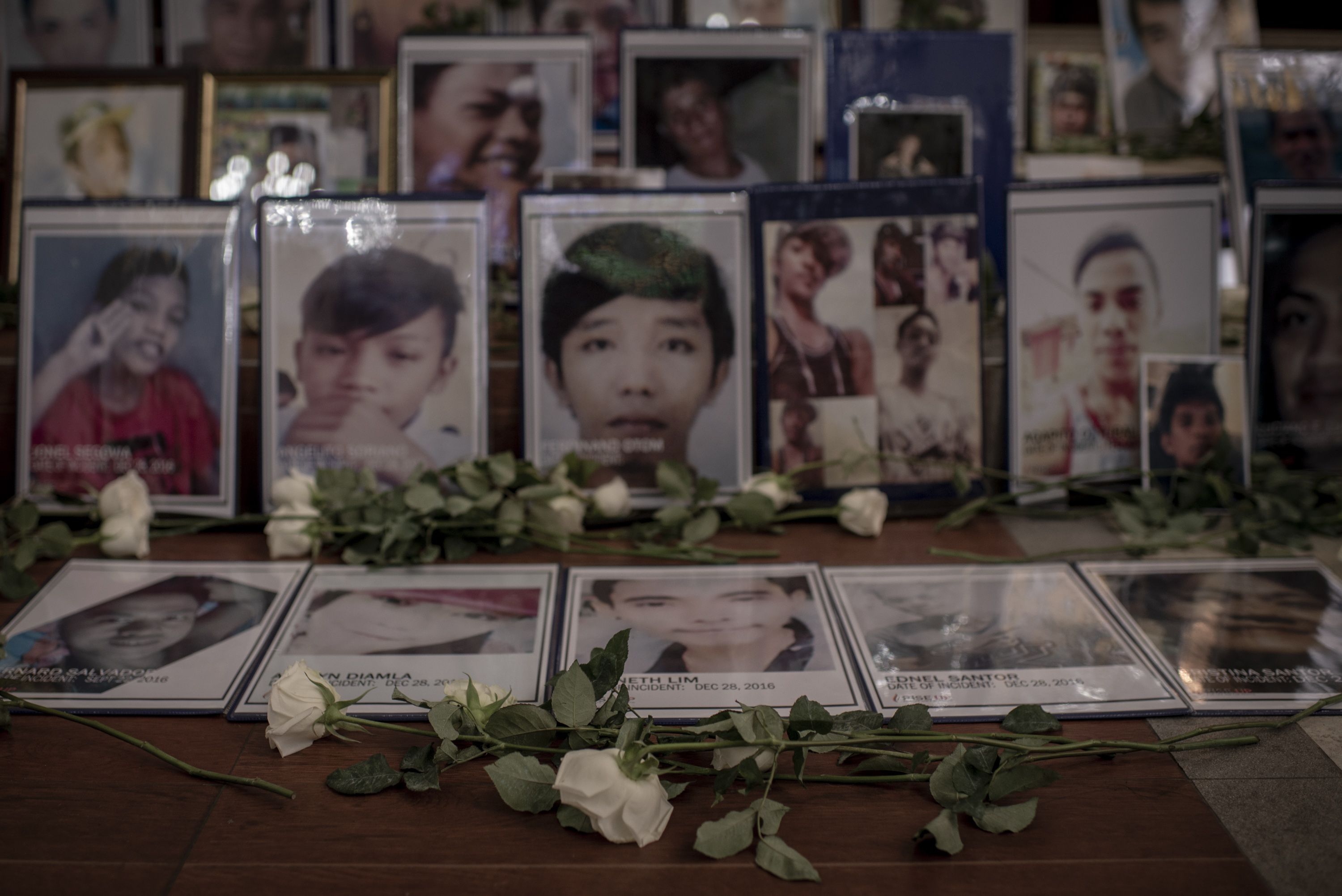 Portraits of slain victims of the Philippine drug war. Image by Eloisa Lopez. Manila, 2018.