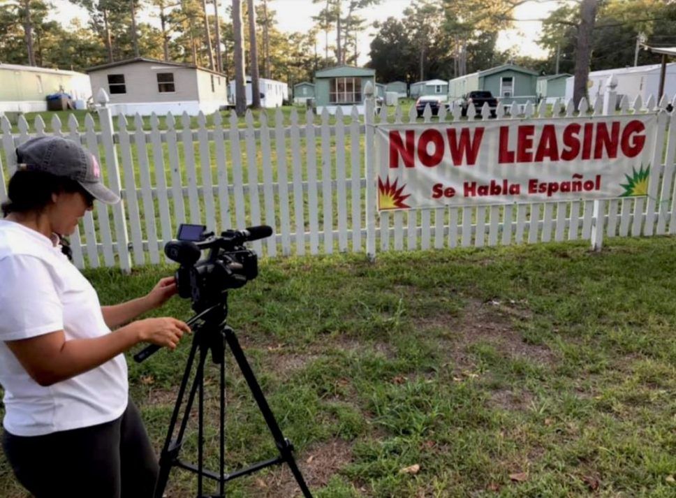 Community journalist Yolanda House films her short-documentary “Mi Casita,” which tells the story of a family and their struggle to stay in their home after Hurricane Florence. Image courtesy of Working Narratives. United States, undated.