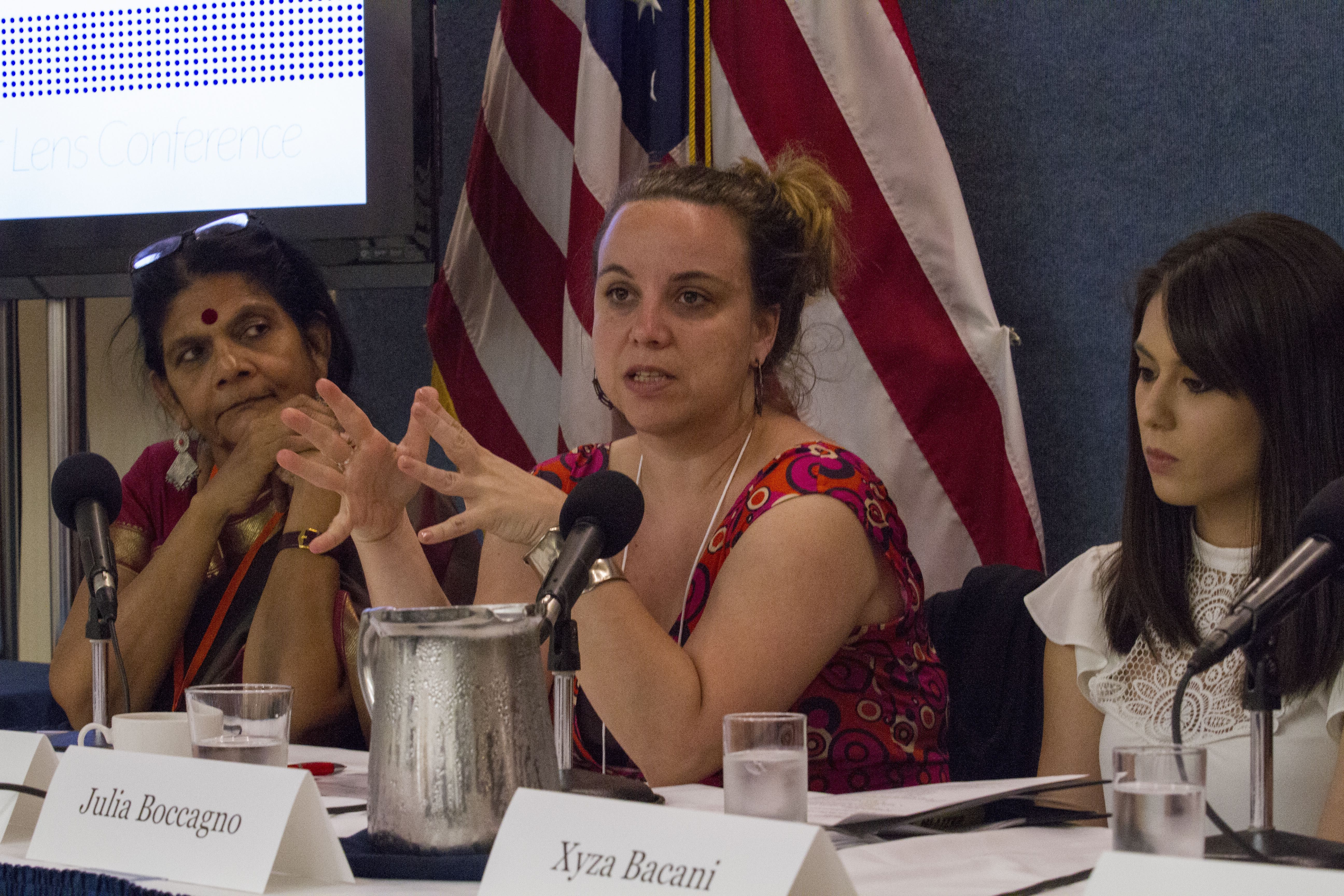 Panelists (from left to right) Chetna Gala Sinha, Jina Moore and Julia Boccagno focus on issues including labor migration, the status of transgender people in Thailand, and gender auditing in Rwanda during the panel on Labor & Economics at the Pulitzer Center Gender Lens Conference. Image by Jin Ding. United States, 2017.