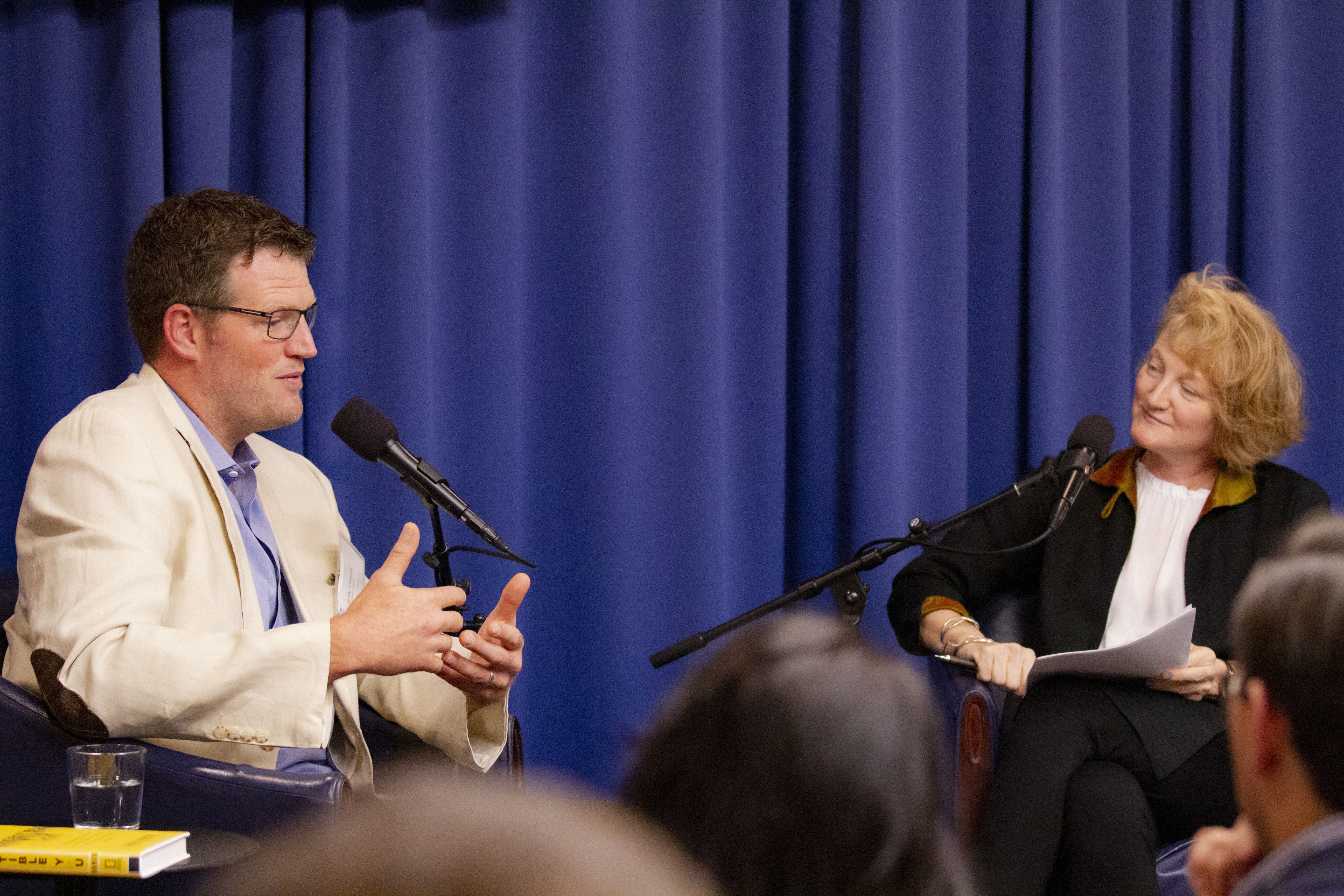 Grantee Erik Vance and On Being radio host Krista Tippett discuss ways to bridge the gap between science and religion. Image by Jin Ding. Washington, D.C., 2019.