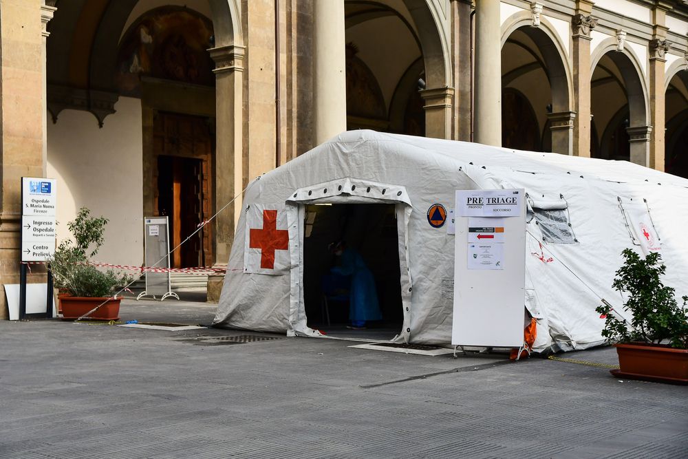 Specially equipped coronavirus station near the hospital in central Florence. Image by Elena.Katkova/Shutterstock. Italy, 2020.