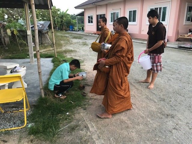 Collecting the morning alms