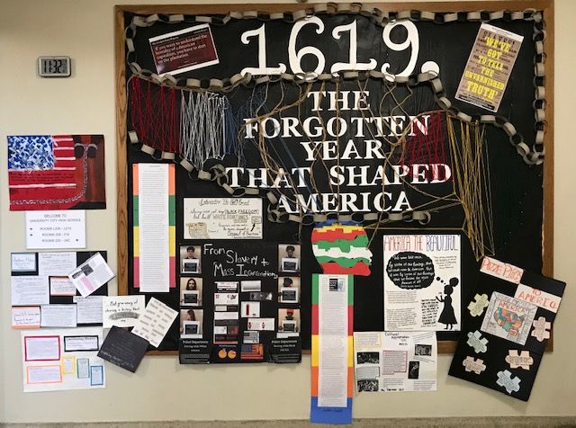Bulletin board created by University City High School students during their investigation of issues explored by The 1619 Project. Photo by Christina Sneed. St. Louis, 2020.