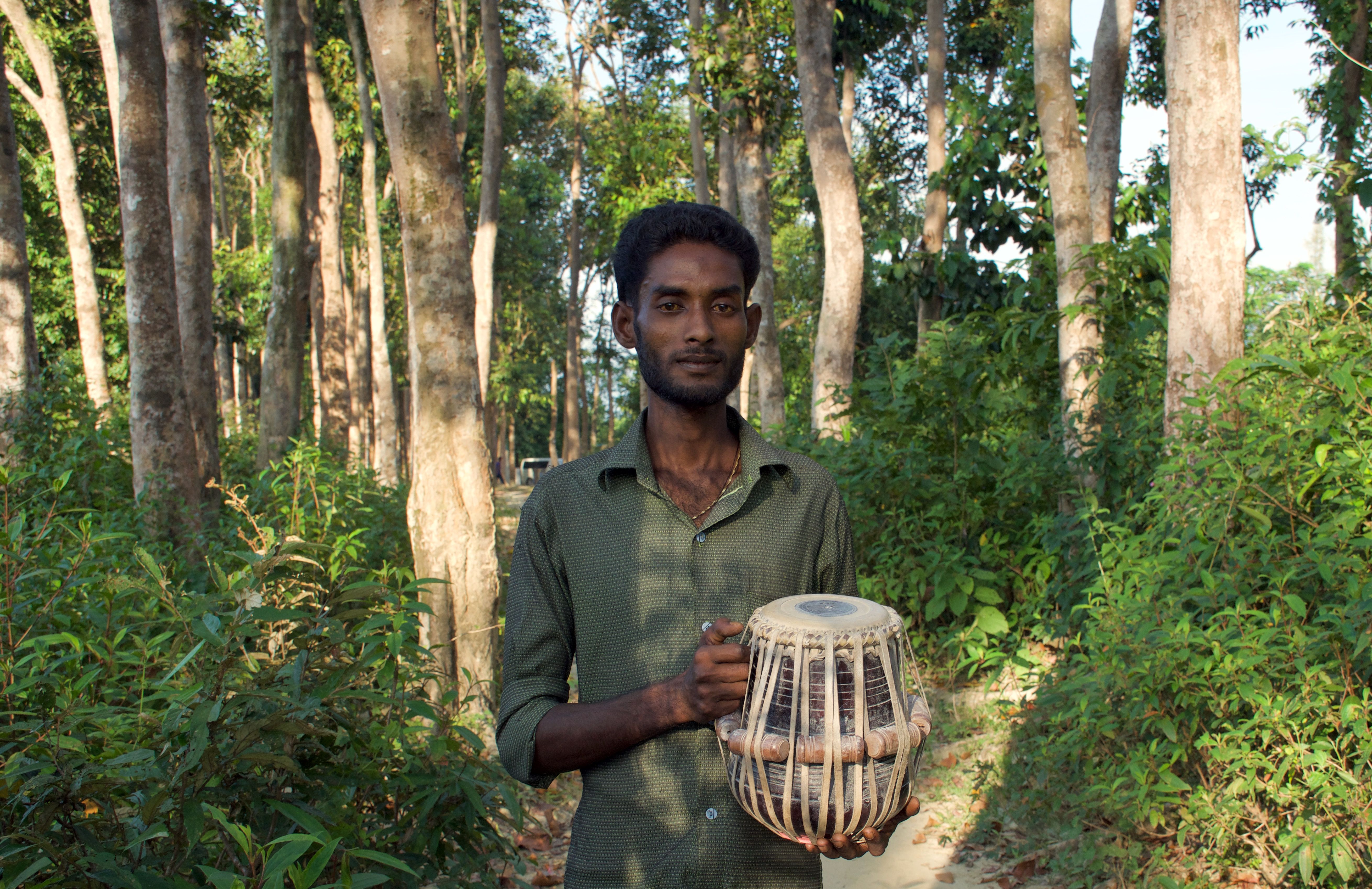 Sayed learned to play the tabla drums on St. Martin's Island, a vacation destination in Bangladesh. Image courtesy Music in Exile. Bangladesh, 2019. 