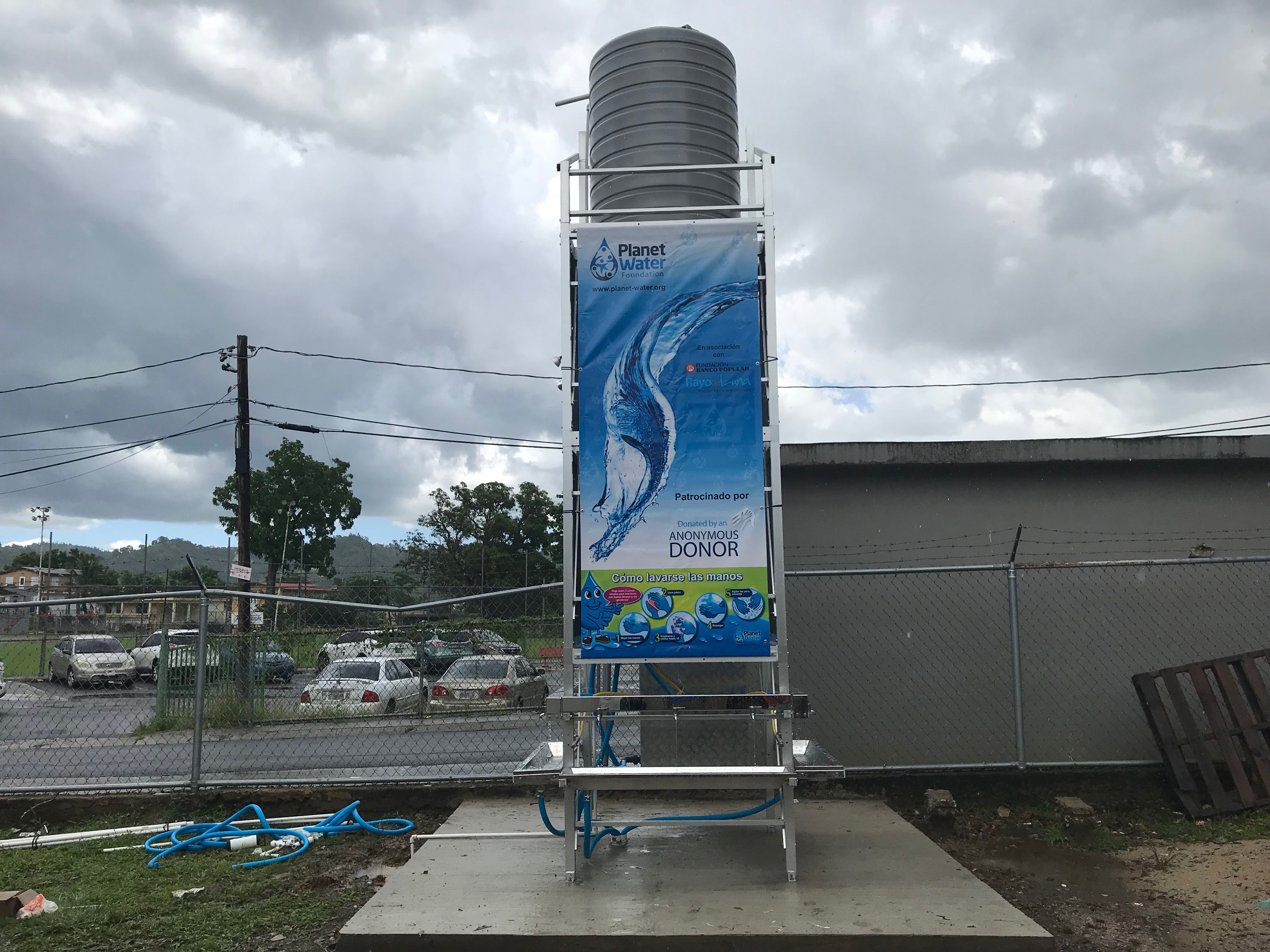 The water tower, provided by the Planet Water Foundation, is capable of supplying 1,000 residents with drinkable water daily. Rayo De Luna has installed 36 towers around the island. Image by Tomas Woodall Posada. United States, 2018.