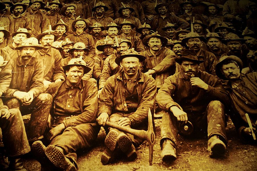 An image of early miners in Ely, who worked by candlelight and braved cave-ins to extract iron ore deep underground, is on display at the Ely Winton Historical Society. Image Courtesy of Ely Winton Historical Society. 
