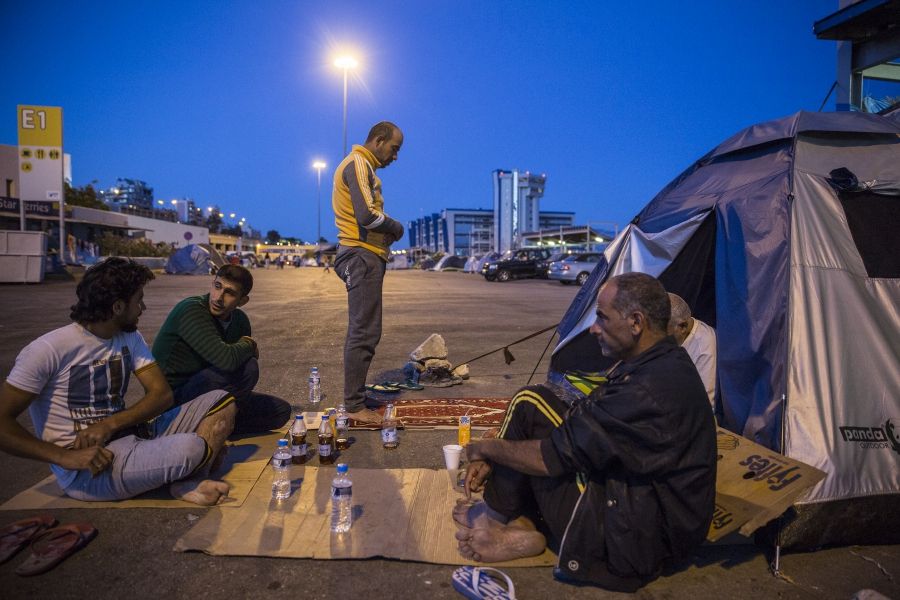 refugees and migrants are living at Piraeus Port Terminal 1 in Athens, Greece