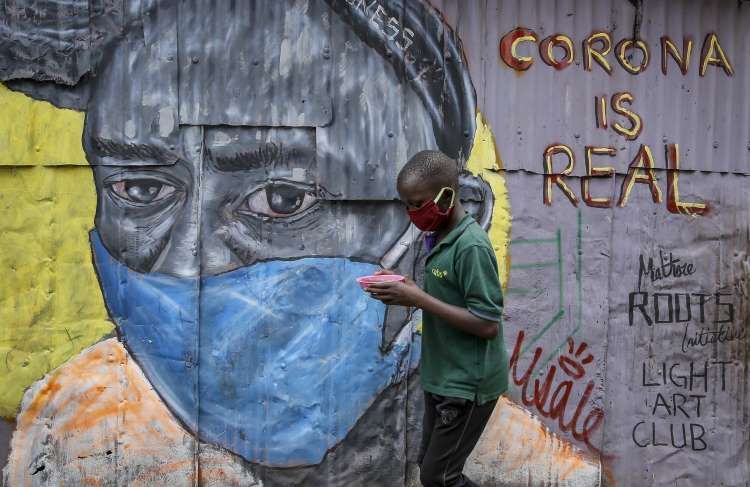 COVID-19 graffiti in Kibera slum, Kenya. Image by Henry Owino. Kenya, 2020.