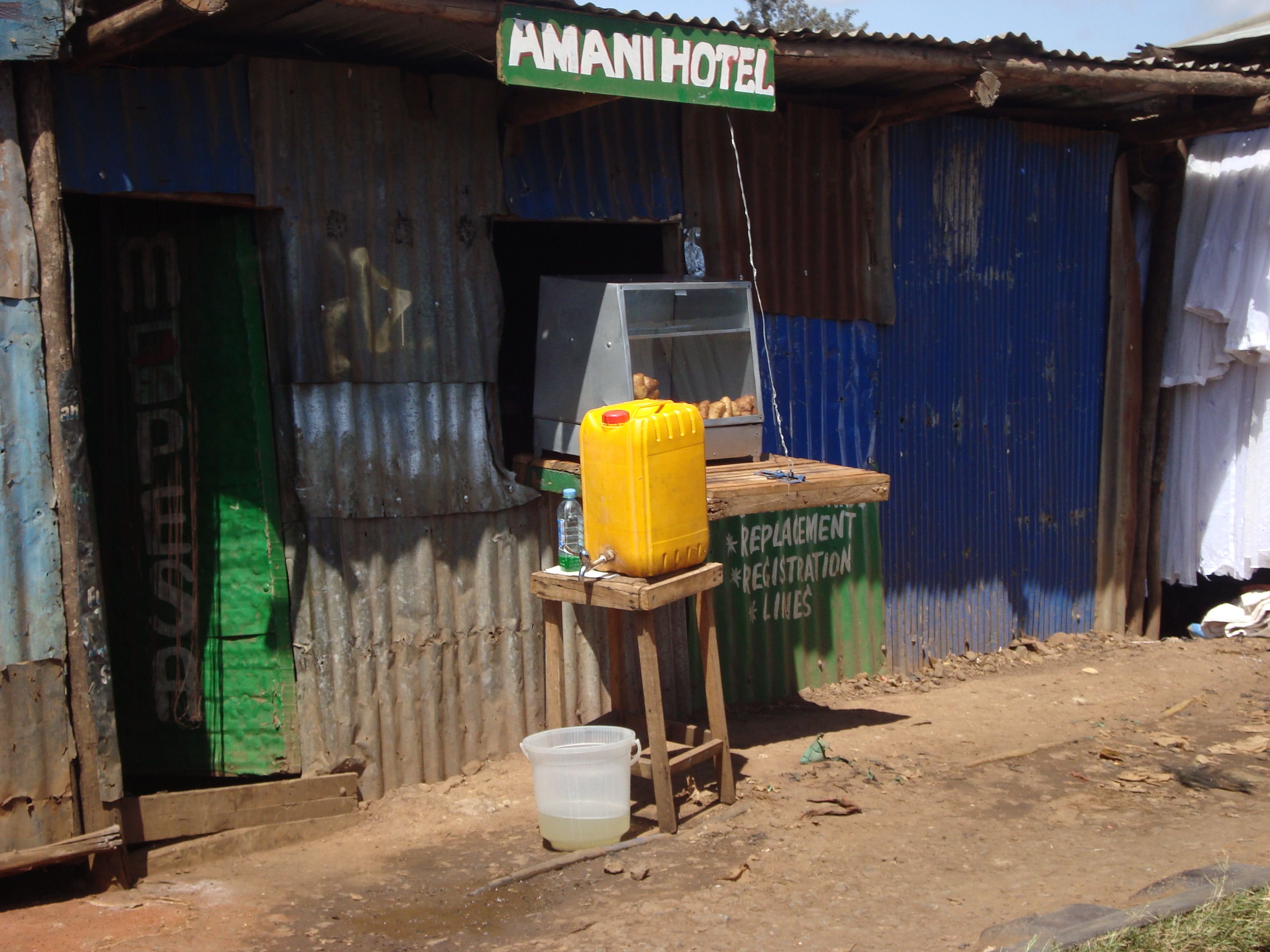 A self-made jerrycan tap for hand-washing at a small eatery in Kiera. Image by Henry Owino. Kenya, 2020.