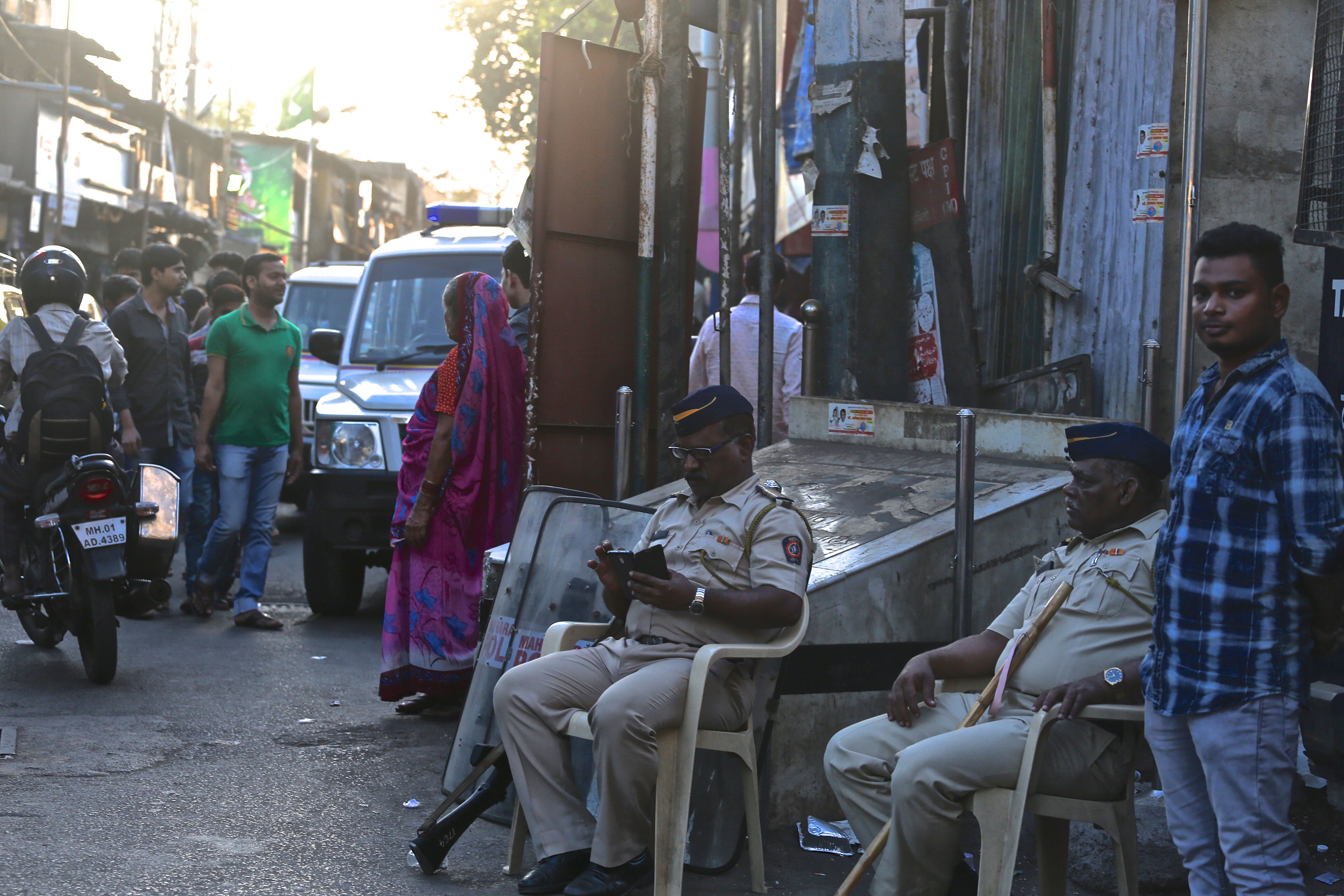 Indian police officers on guard near markets frequented by tourists. Image by Wes Bruer. India, 2017.