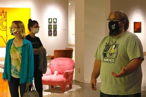 Melinda Febus, left, Jasmine Febus and Robbie Vermillion, all of Urbana, during a visit to the Rockford Art Museum on Tuesday. Image by Susan Moran/Rockford Register Star. United States, 2020.