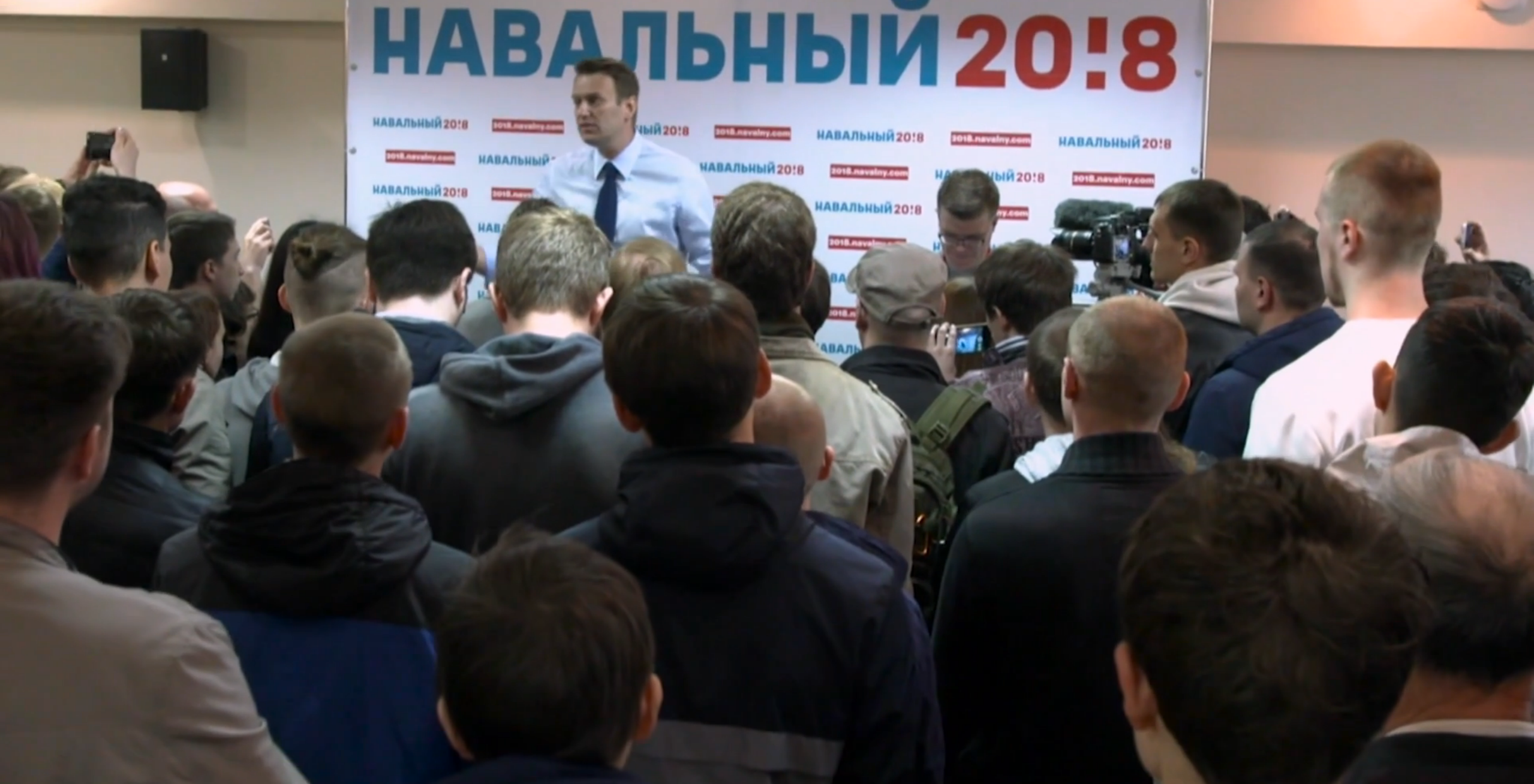 Alexei Navalny, Putin's opposition, at a campaign event. Image from PBS NewsHour. Russia, 2017.