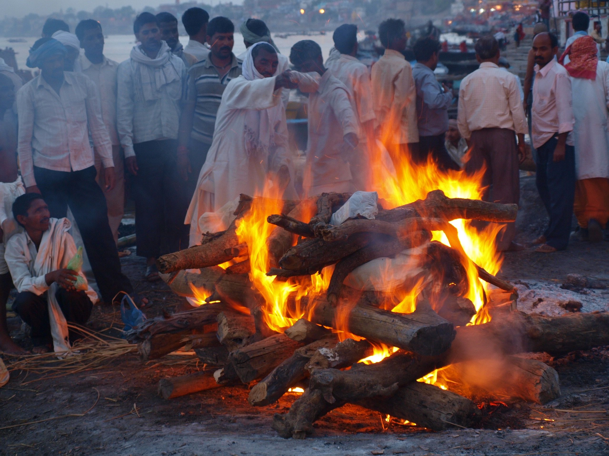 Hindus believe that cremation in Varanasi frees them from the cycle of birth, death, and reincarnation. Image by George Black. India, 2016.