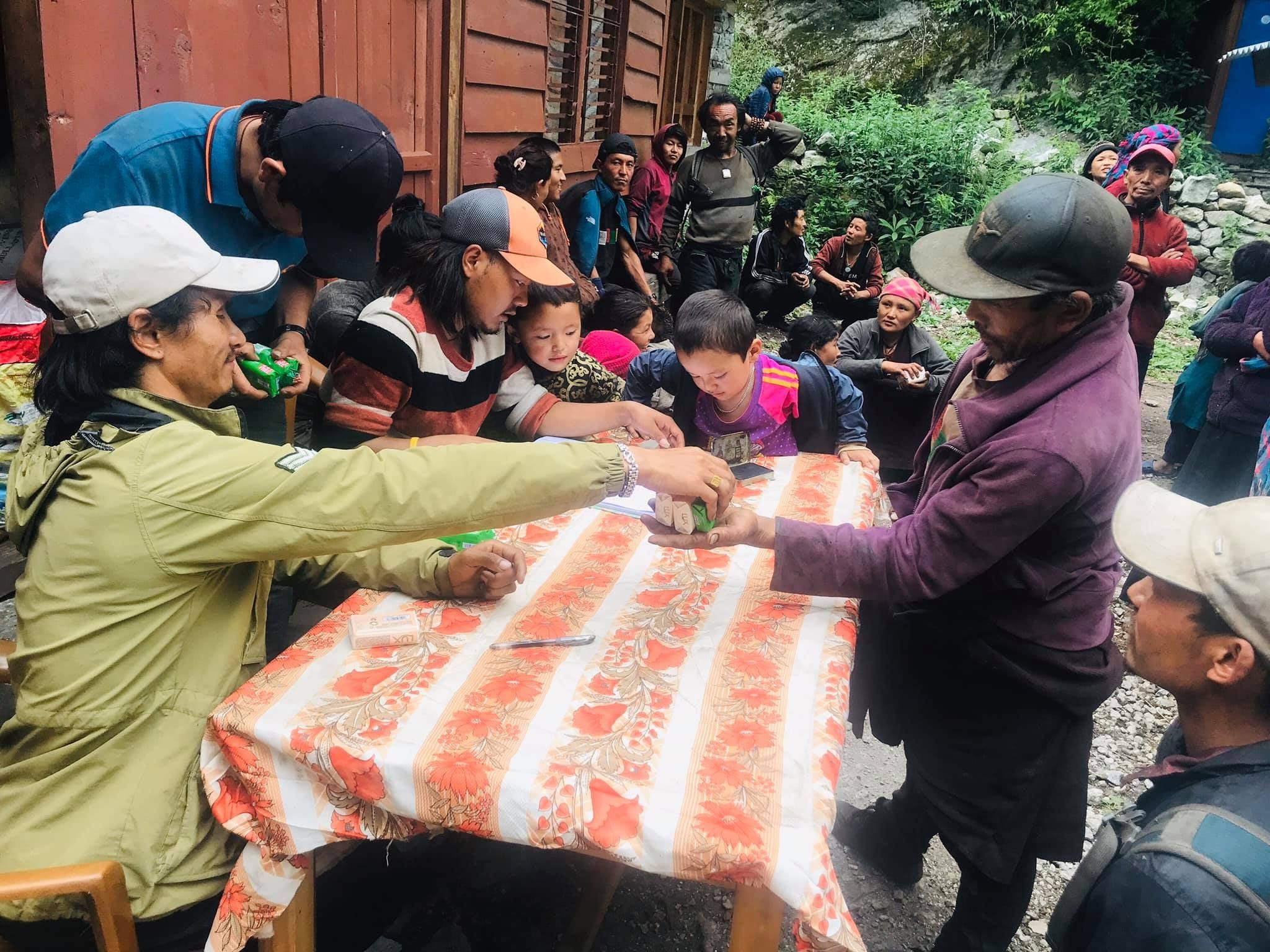 Soap distribution to the villagers of Namrung, Nubri, June 2020. Image by Pema Dhundup. Nepal, 2020.