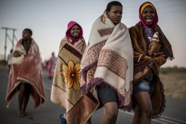 Young women in KwaZulu-Natal, South Africa: where in some communities, 15-year-old girls have an 80% chance of acquiring HIV in their lifetime. Image courtesy of Marco Longari/AFP/Getty Images. South Africa, 2016.