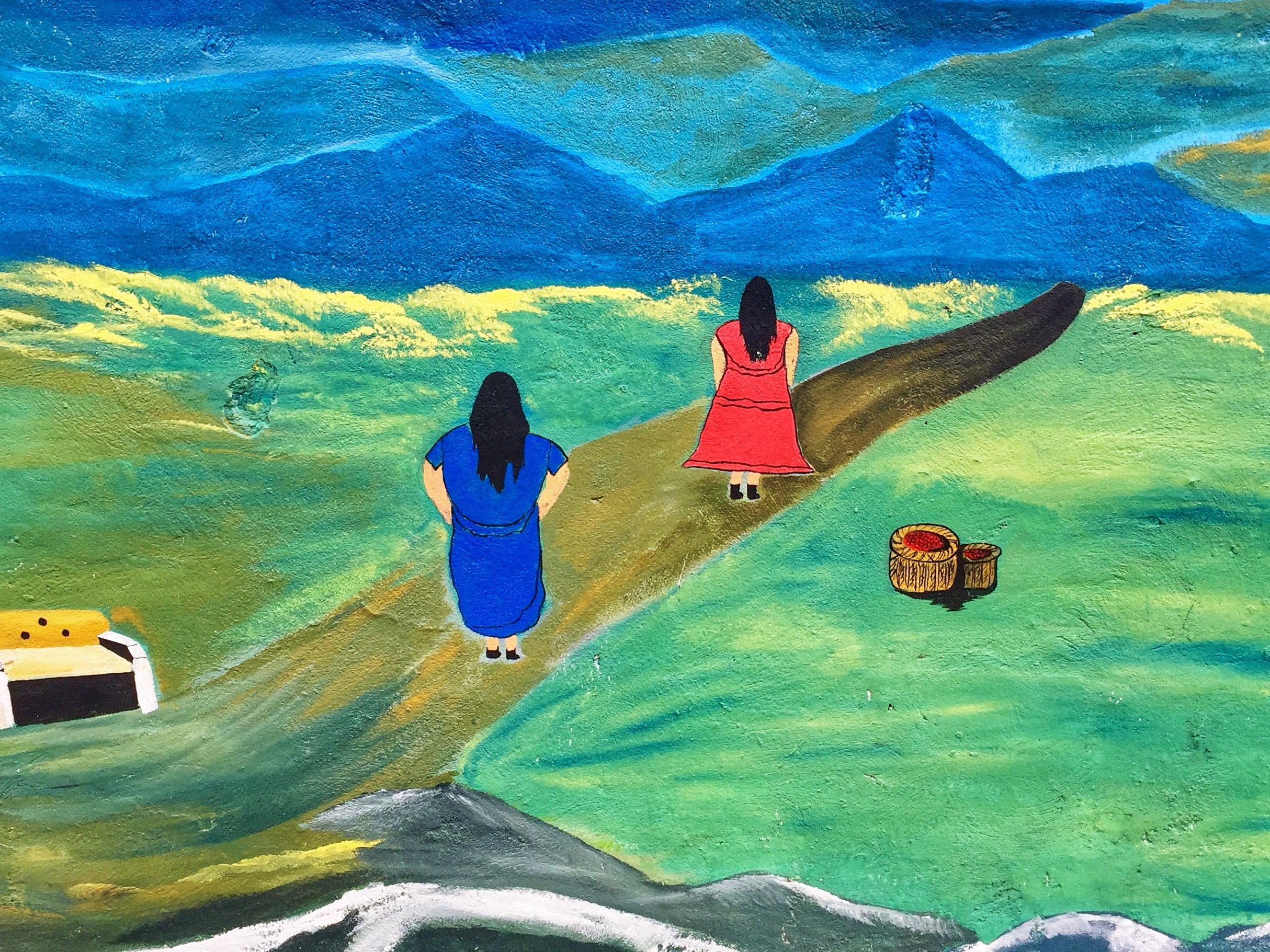 Mural in the capitol of Coto Brus depicts indigenous women, in traditional clothing, making the long journey into the mountainous terrain of Southern Costa Rica and Panama. Image by Samira Tella. Costa Rica, 2018.