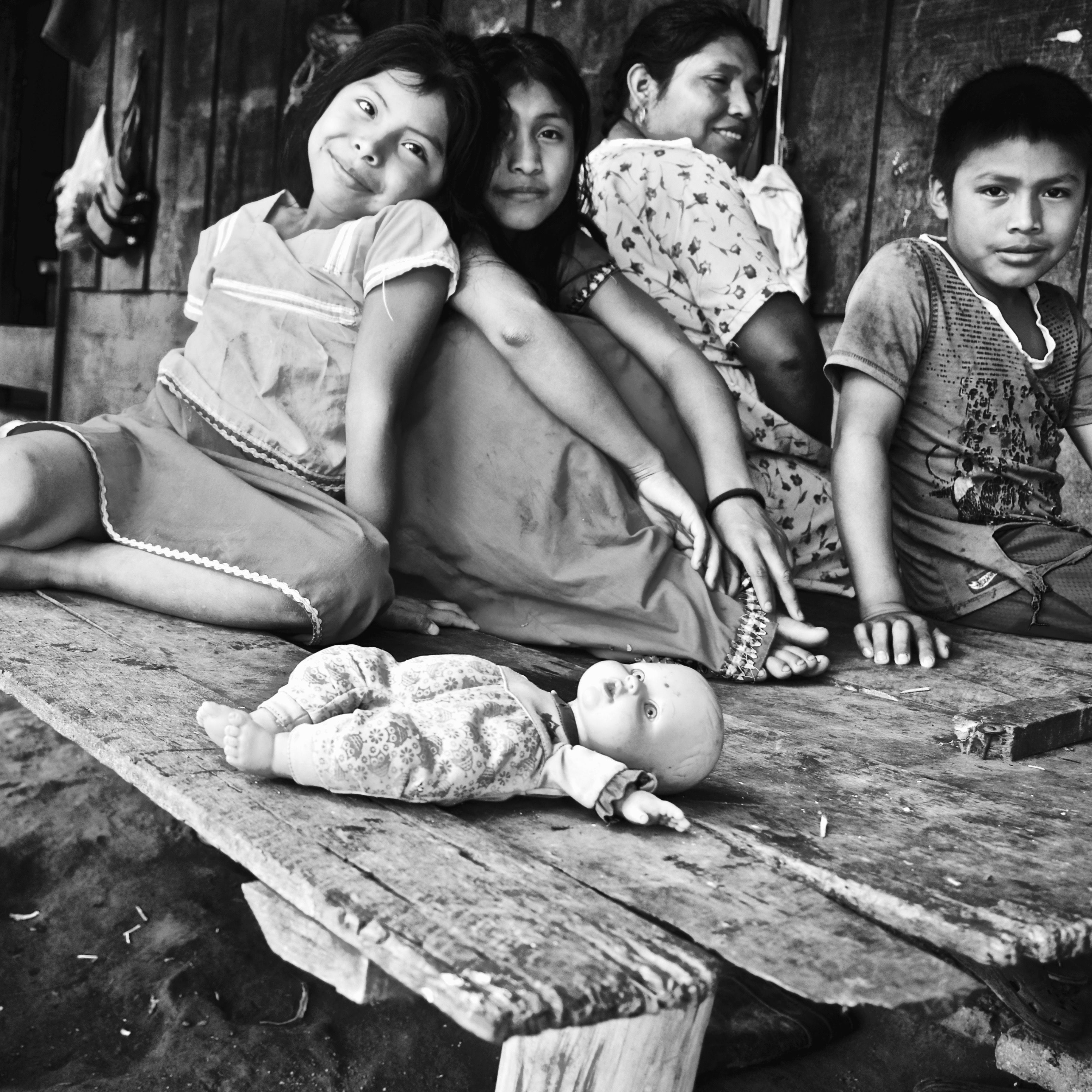 Naida and her family live in a bache located on a coffee farm in southern Costa Rica. With her husband and children, she waits yearly for the coffee harvest in order to gain income for her family. Image by Samira Tella. Costa Rica, 2018.