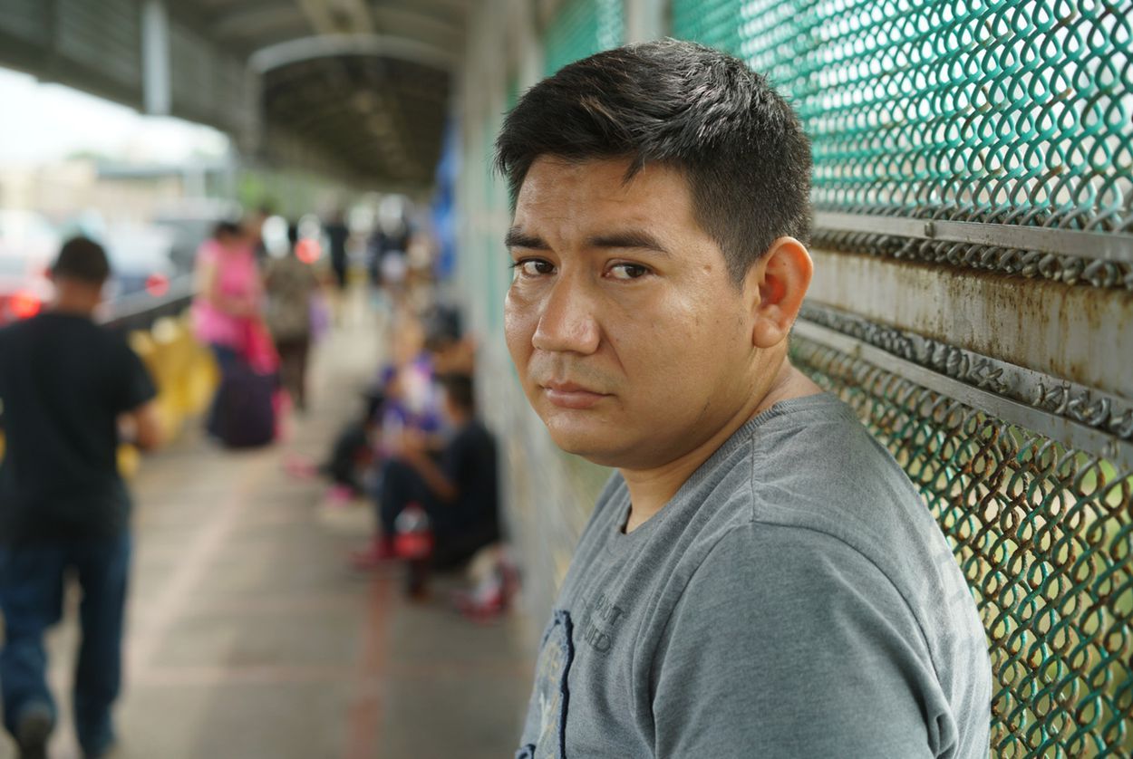 Marcos Samayoa waits on the Brownsville/Gateway International Bridge in June 2018. Image by Reynaldo Leal. Matamoros, 2018. 