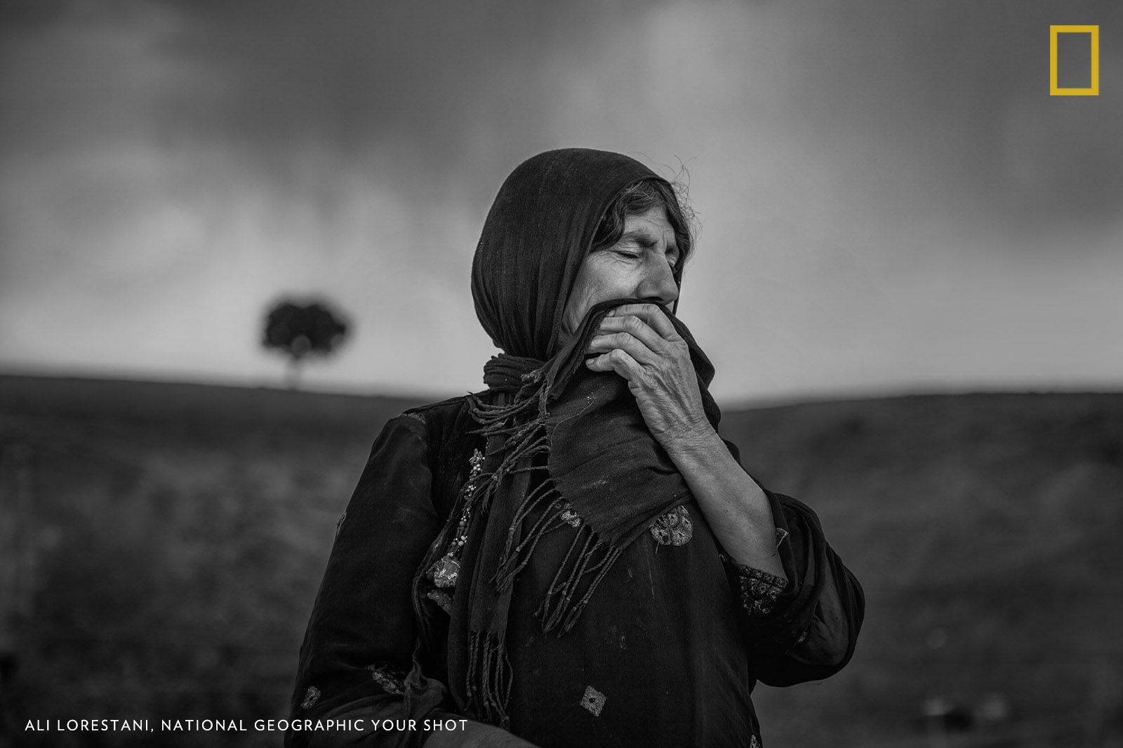 A Kurdish woman with anxiety, sadness, hope… full of life.  She has no way, no other choices. She has to continue and look forward to something. She has a treasure called hope. Image by Ali Lorestani.
