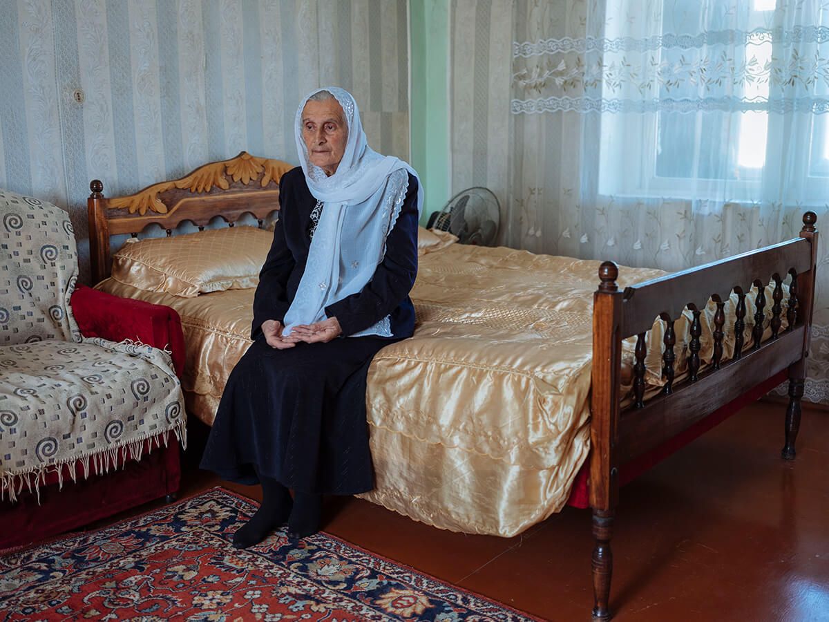 Febriye Sabaonva, 78, on her bed in Astara's Kakalos village. Her family has lived in this area since her grandfather, originally from Baku, married a Talysh woman in the south. Image by Emin Özmen/Magnum Photos. Azerbaijan, 2018.