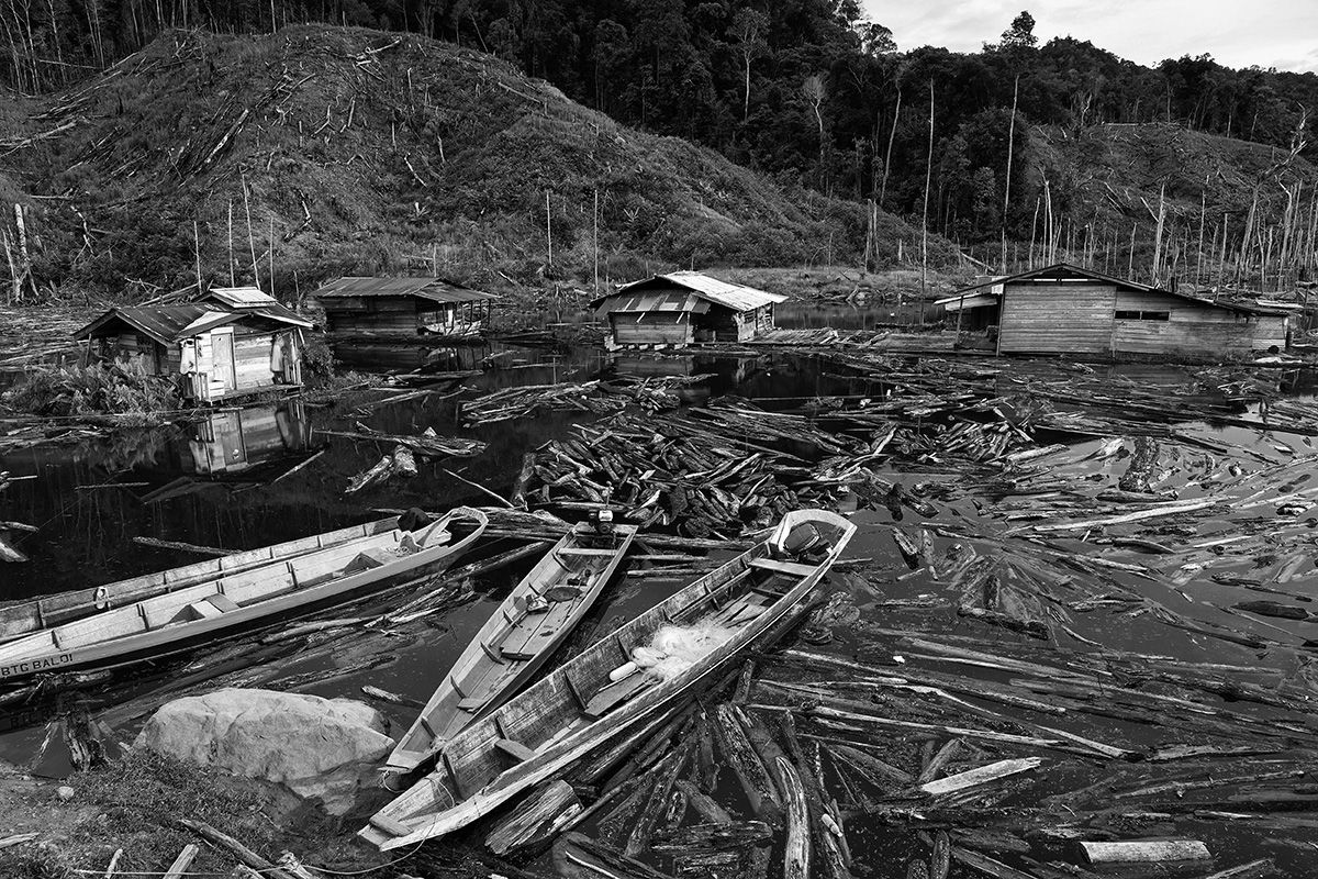 Fishing boats at the longhouse Uday and John have joined. Image by Stuart Franklin/Magnum Photos. Malaysia, 2018.