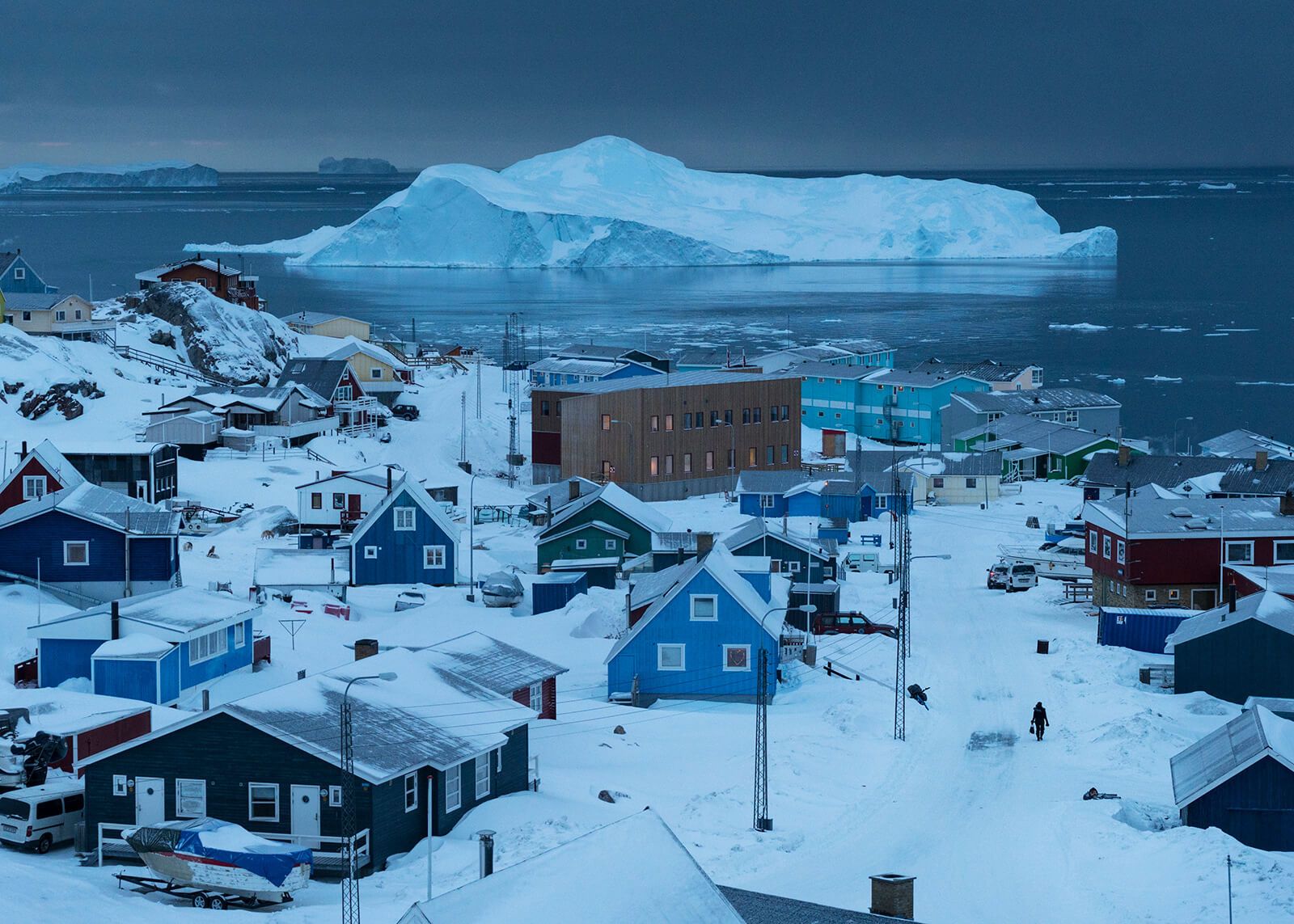 The town of Ilulissat, Greenland's third largest, with a population of 4,400. Image by Jonas Bendiksen/Magnum Photos. Greenland, 2018.