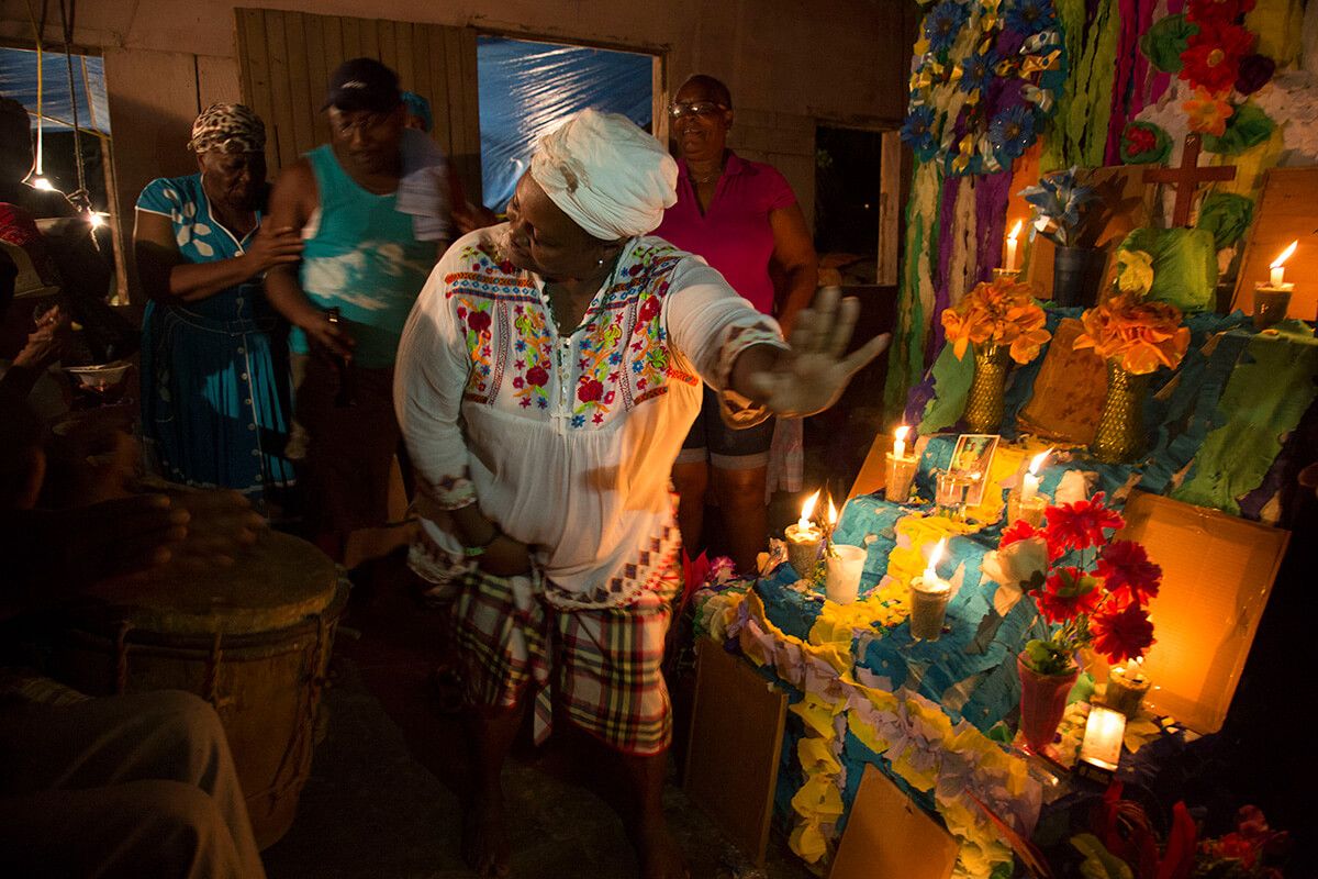 An anniversary mass in remembrance of a local Garifuna man. Image by Susan Meiselas/Magnum Photos. Honduras, 2018.