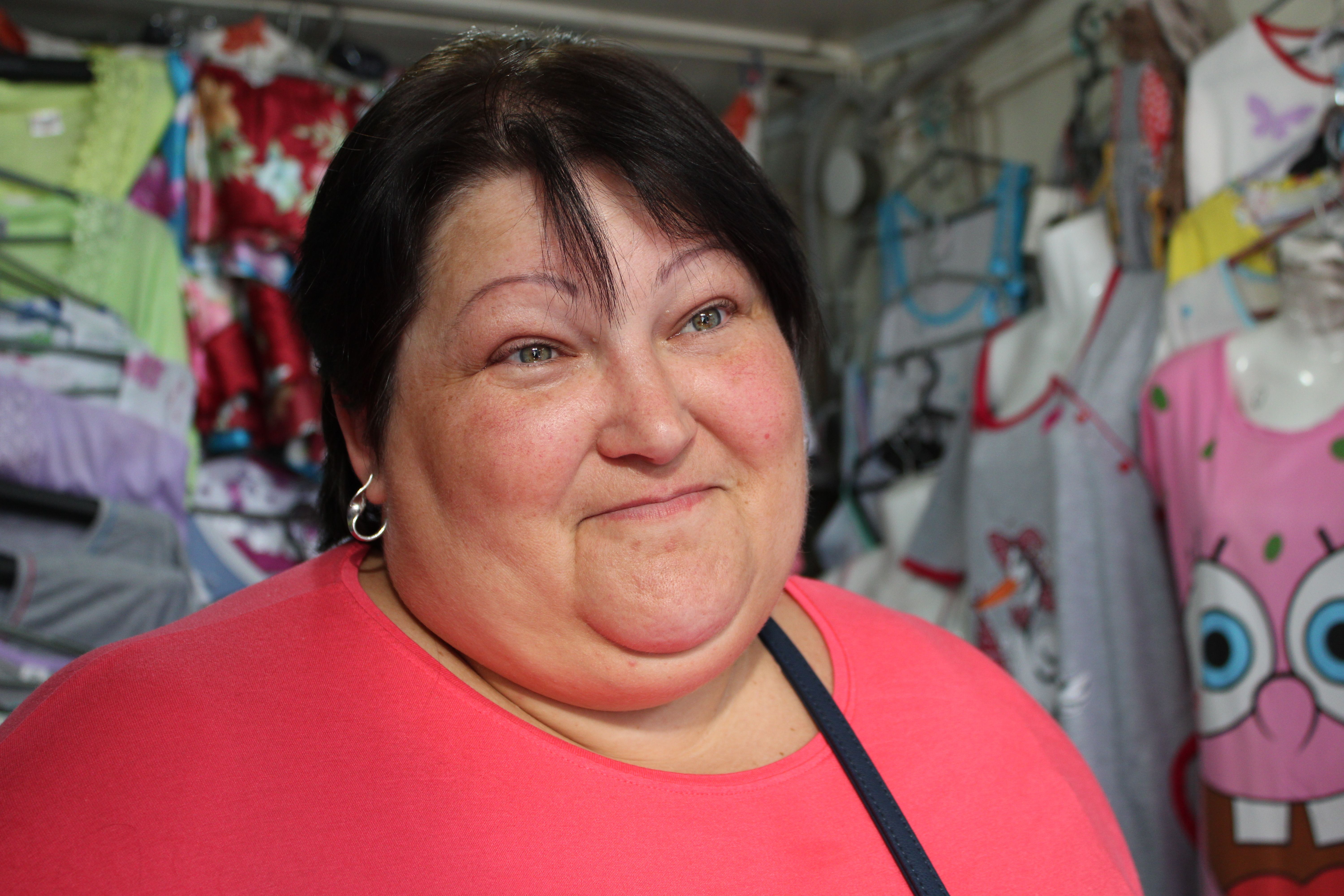 Tetiana Bondar, Mariupol vendor and co-founder of an organization that assists internally-displaced families, remembers the first domestic refugees from nearby occupied territories. Image by Taylor Damann. Ukraine, 2019.