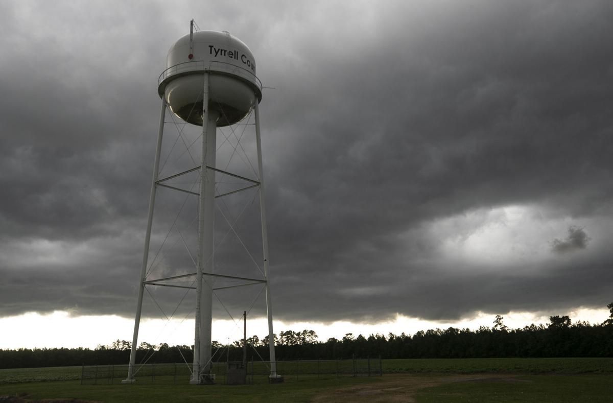 A thunderstorm moves over the Tyrrell County water tower at the water treatment plant on Thursday, July 23, 2020. Image by Robert Willett / The News & Observer / North Carolina News Collaborative. United States, 2020.
