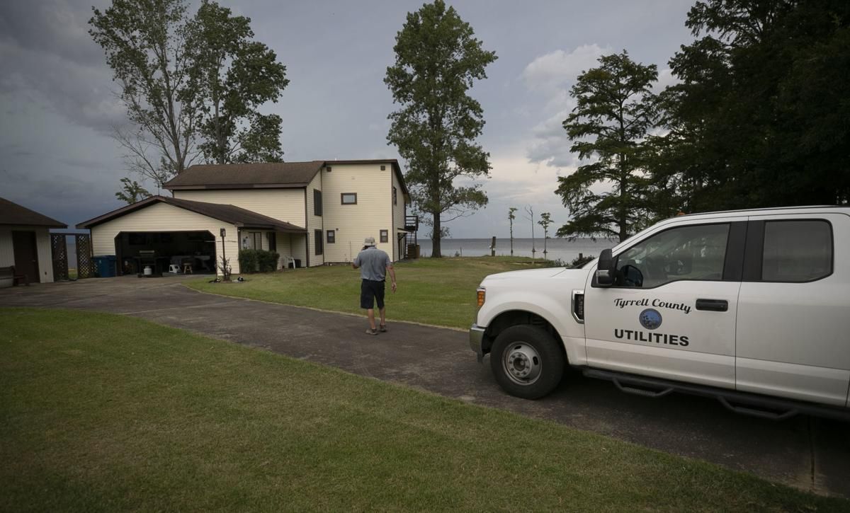 Tyrrell County Water/Sewer Department supervisor Johnny Spencer stops to find a water leak at a residence on Folly Landing Road in Tyrrell County on Thursday, July 23, 2020. Image by Robert Willett / The News & Observer / North Carolina News Collaborative. United States, 2020.