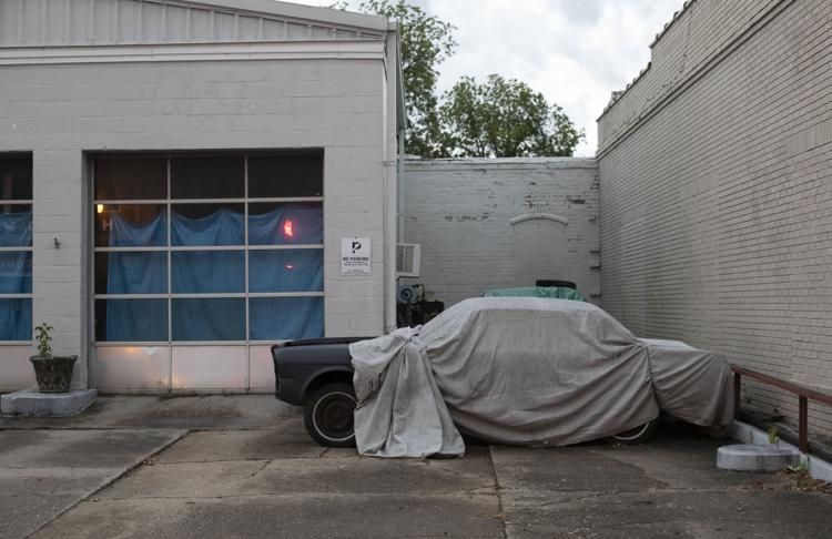 A vintage car stored at a former service station on Main Street in Columbia, N.C. on Thursday, July 23, 2020 in Tyrrell County, N.C. Image by Robert Willett / The News & Observer / North Carolina News Collaborative. United States, 2020.