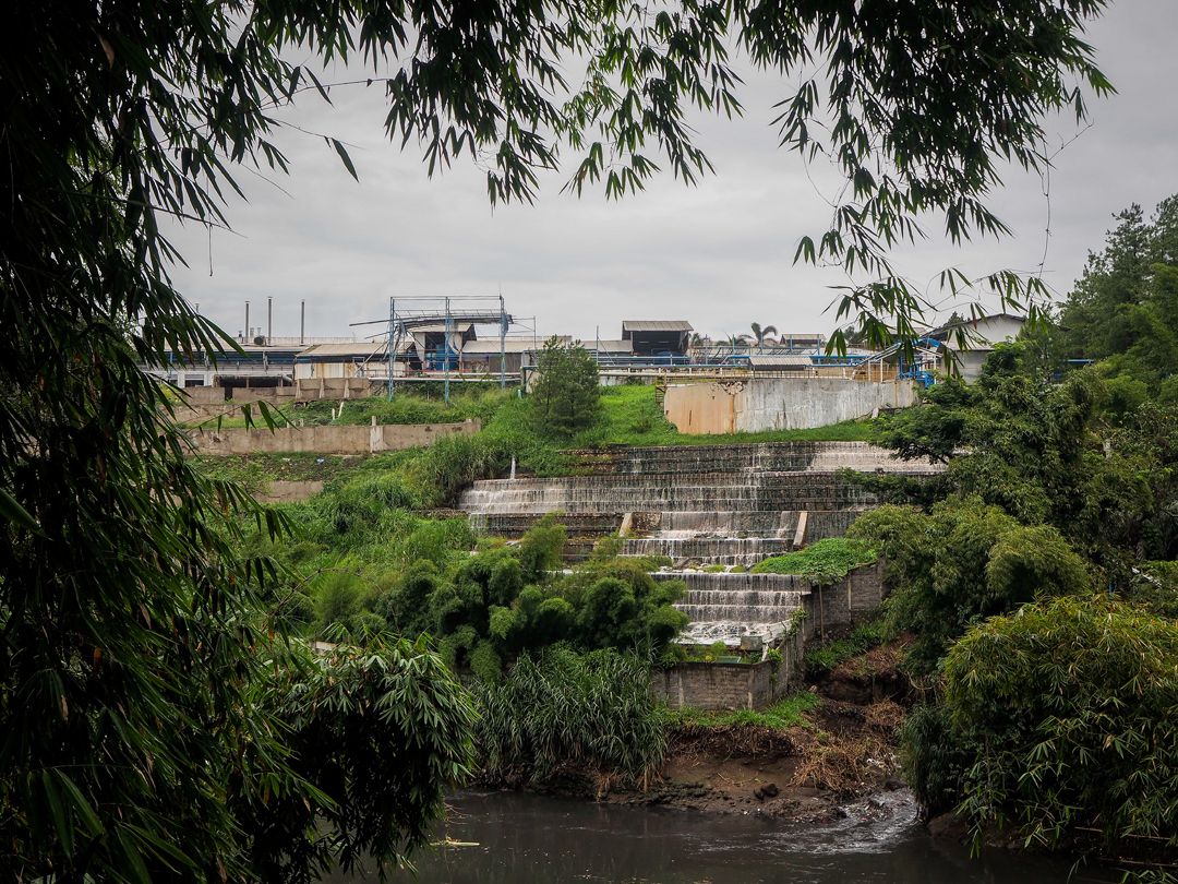 A view of waste water outfall of the PT. Gistex Textile Division plant on the Citarum River at Margaasih. Image by Larry C. Price. Indonesia, 2016.
