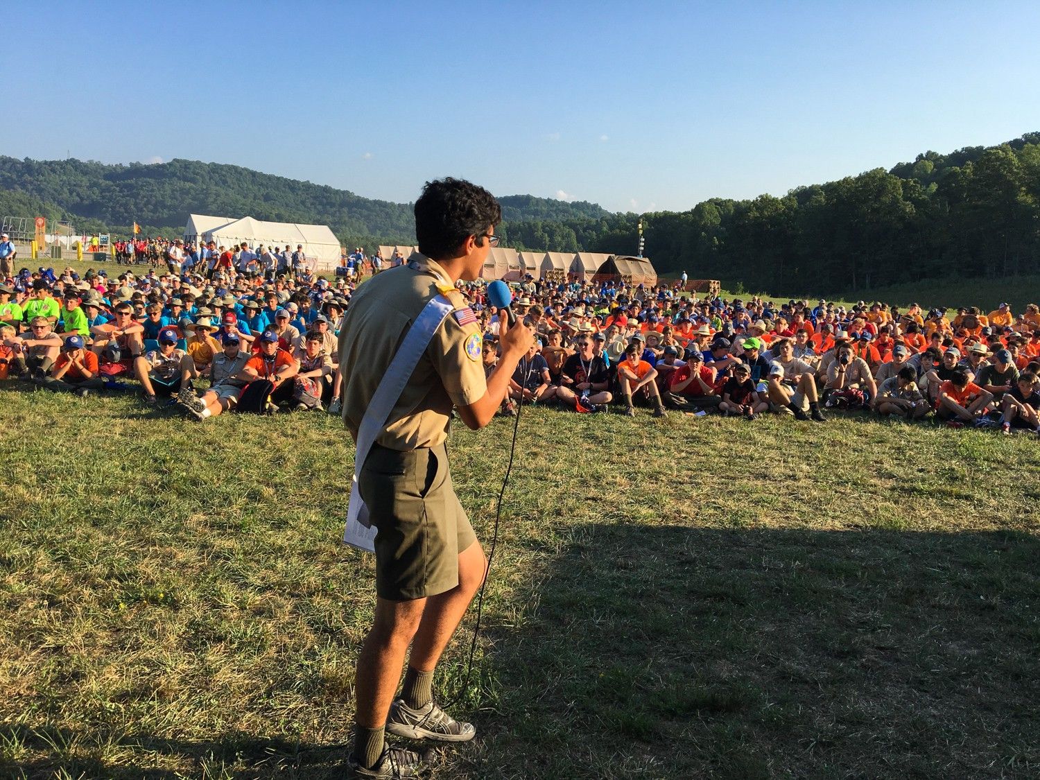Manny Lopez, an Eagle Scout from California, talks to more than a thousand fellow scouts at Base Camp Delta about the Out of Eden Walk and the opportunity to join Paul Salopek on the trail. Image by Mark Schulte. United States, 2017.