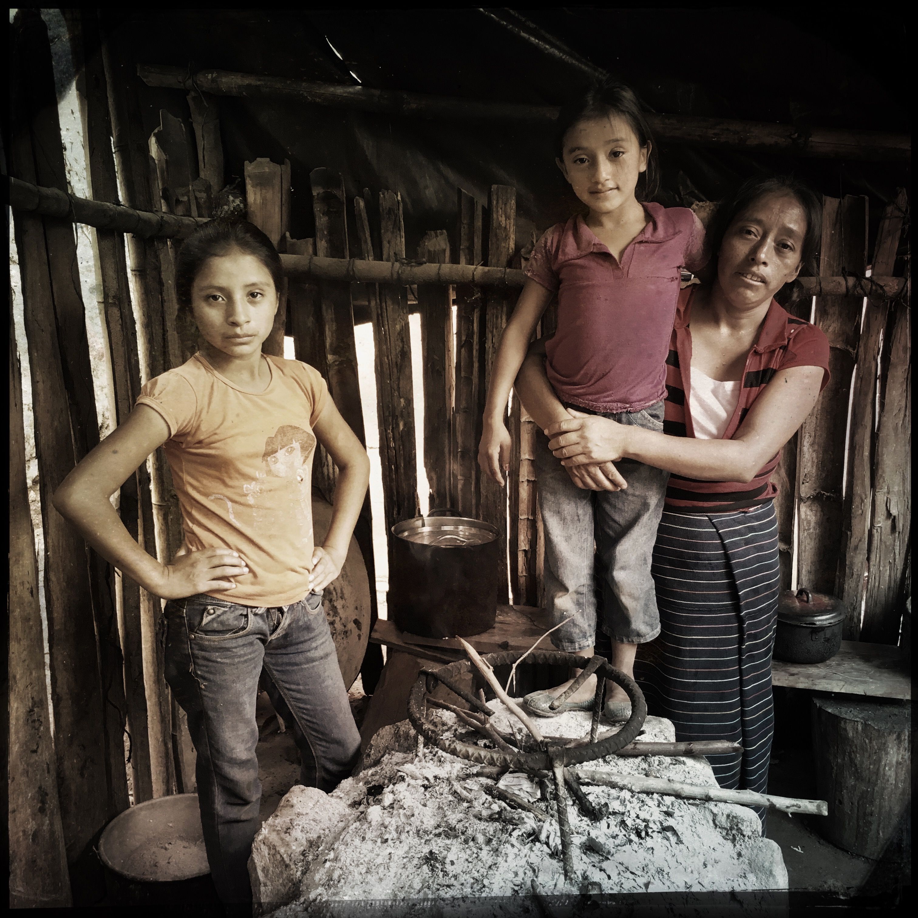 These young people in San Ramon, Guatemala, have grown up around their family’s open cooking fire. Photo by Lynn Johnson. Guatemala, 2017.