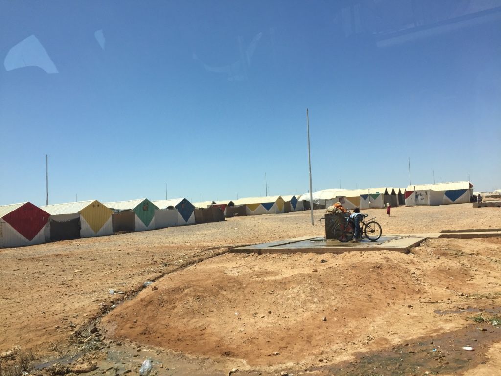 Azraq is less populated but more organized than the more famous Za'atari Camp. Much of the camp has unreliable electricity, but will eventually receive solar power. Refugees complain that the communities are too spread apart from one another and traveling around the camp is too difficult. Image by Rachel Townzen. Jordan, 2016.