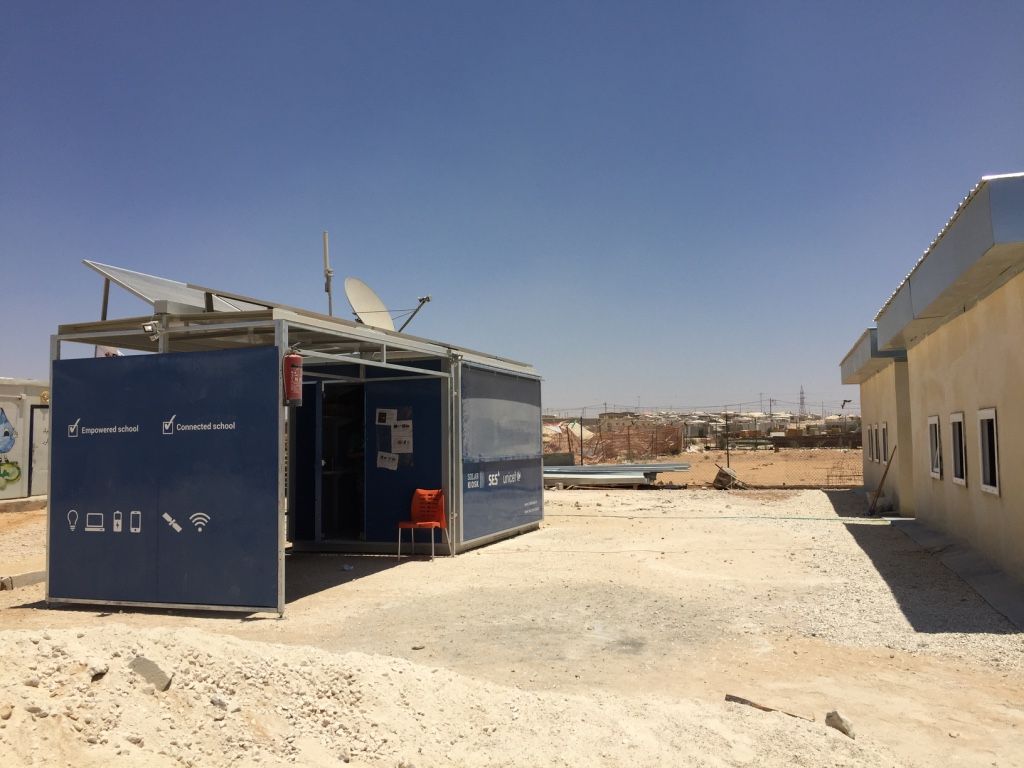 A recently installed solar kiosk in Za’atari Camp. The kiosk will have access to limited websites, with the intention of supplementing educational activities in this district of the camp. Image by Rachel Townzen. Jordan, 2016.