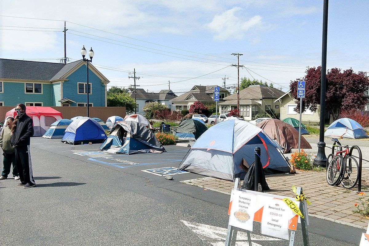 The emergency tent shelter in Arcata, California, shown here on April 19, helps unsheltered homeless people gain access to medical and other services during the COVID-19 pandemic. Image courtesy of Arcata House Partnership. United States, 2020.