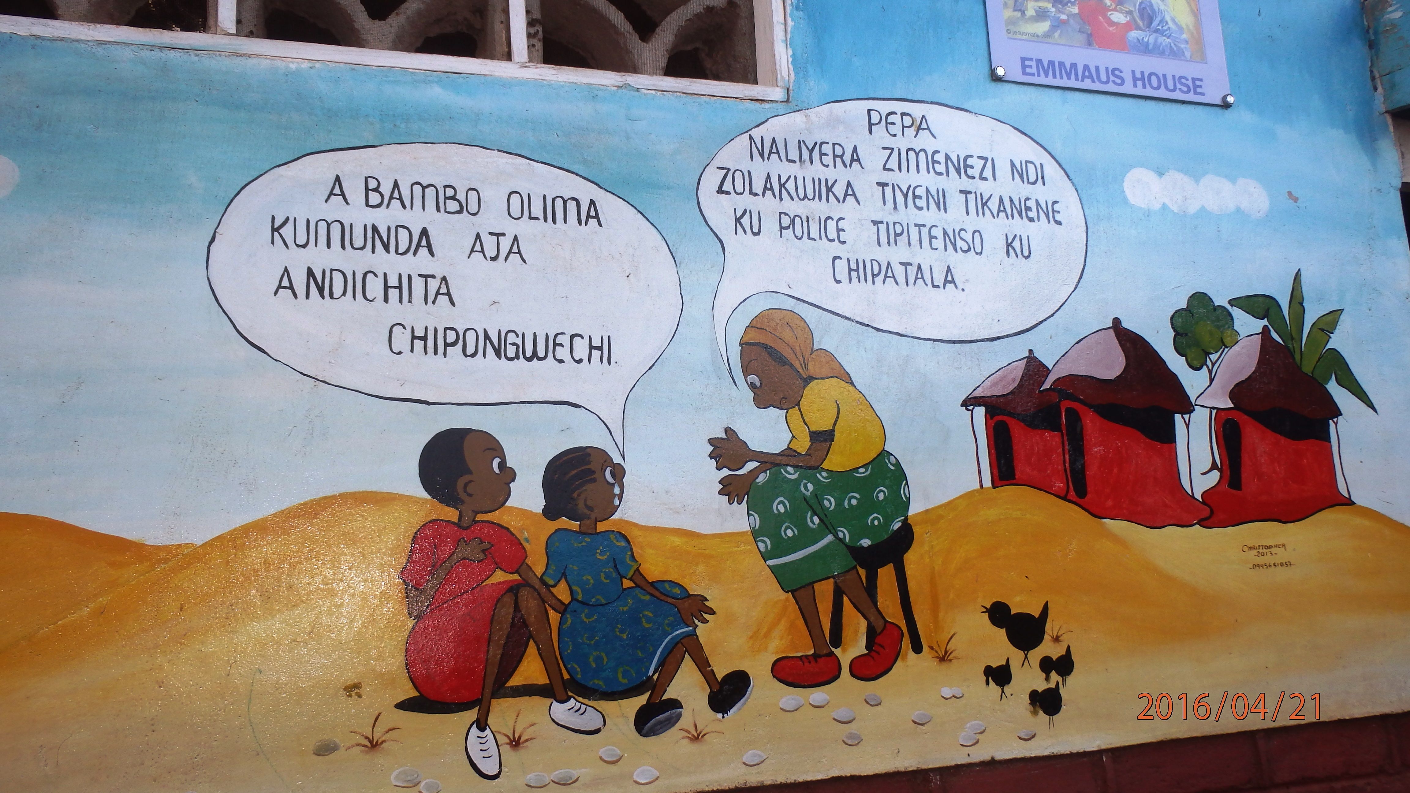 Cartoon at Tikondane Care for Children In and Off the Street showing girls to tell an adult if something has happened to them.  Image by Jen Stephens.  Malawi, 2016.  