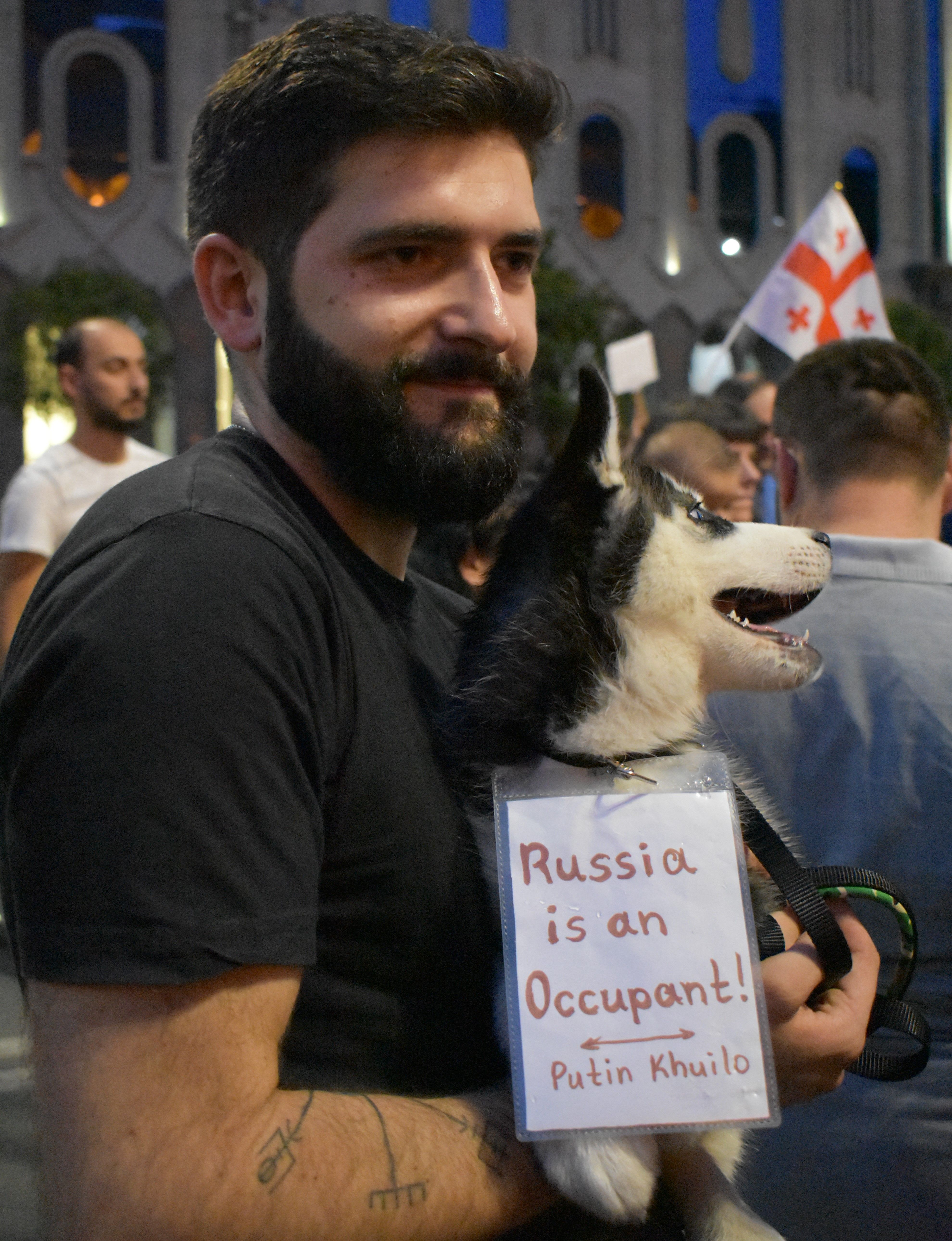 Archa, 28, protests against Russia in front of the Georgian Parliament. Image by Kaitlyn Johnson. Georgia, 2019.