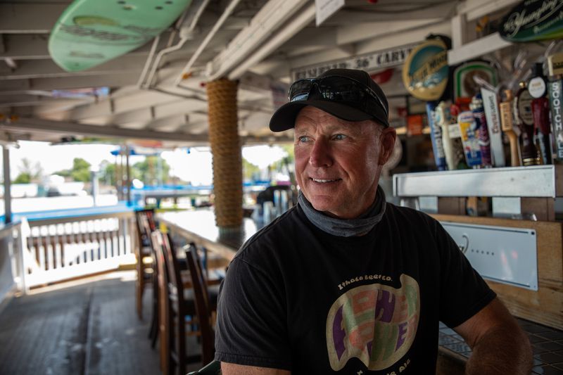 Tom Frank, owner of Captain Jack's Good Time Tavern, at his restaurant on Lake Ontario in Sodus Point, New York, on July 30, 2020. He has suffered flood damage twice since 2017. Image by Zbigniew Bzdak/Chicago Tribune. United States, 2020.