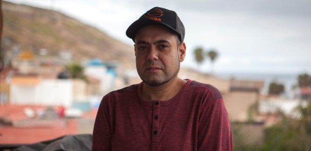 Deported veteran Miguel Perez stands for a portrait in Tijuana, Mexico on May 7, 2019. After being pardoned by Illinois Gov. JB Pritzker, he is asking officials to reconsider his citizenship application. Image courtesy of Erin Siegal McIntyre. Mexico, 2019.