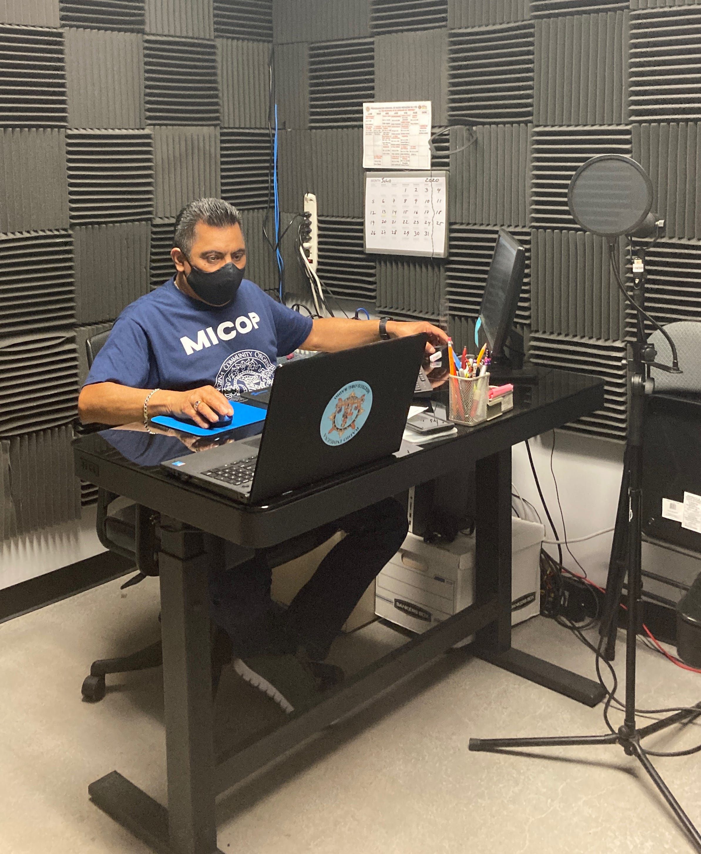Fransisco Ulloa coordinates Radio Indígena from his office space at Mixteco/Indígena Community Organizing Project in Oxnard in July. Image by Julia Knoerr. United States, 2020.