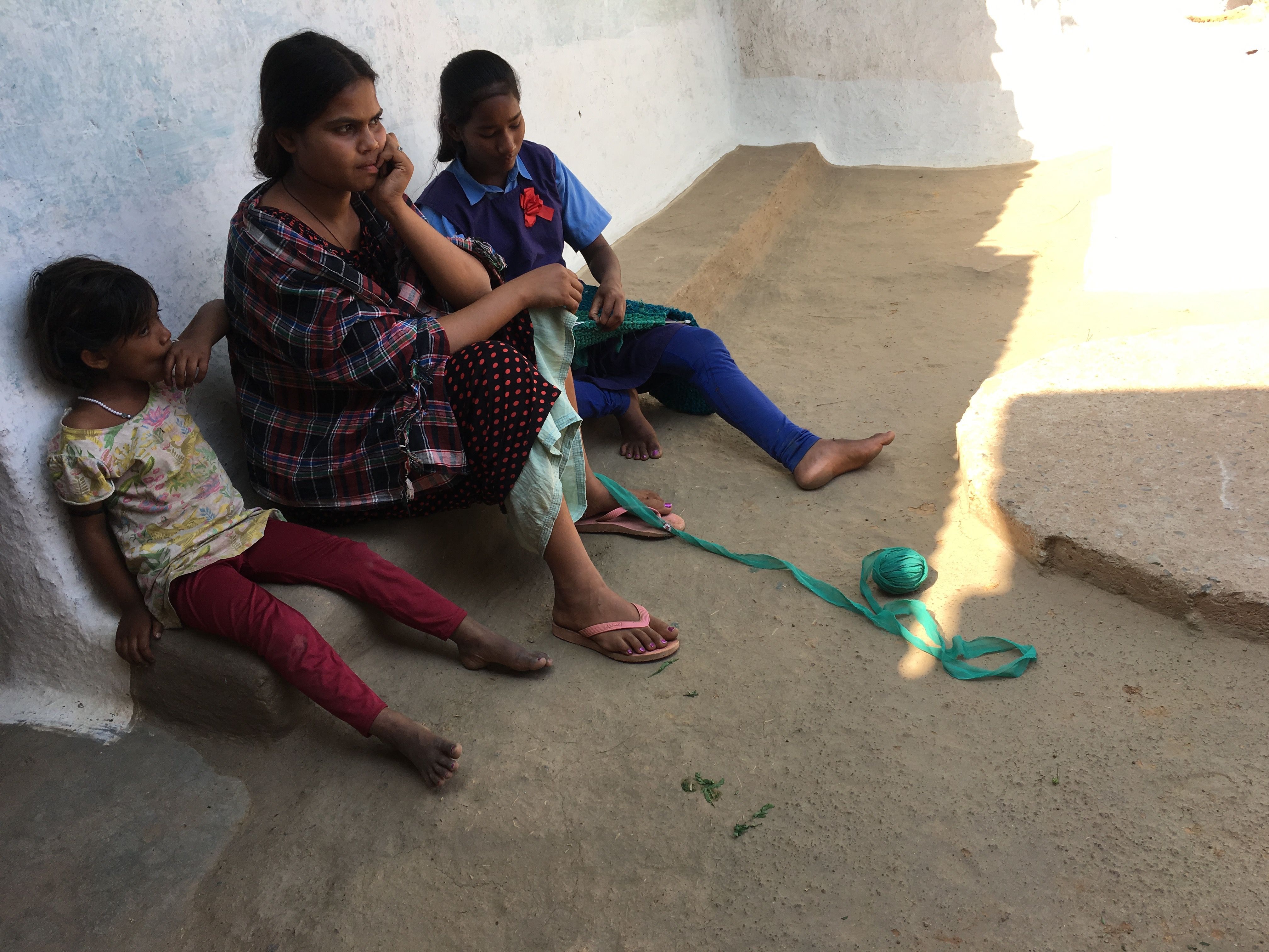 Family members of Shiv Kumari, who was killed at the sterilization camp. Image by Hannah Harris Green. India, 2018