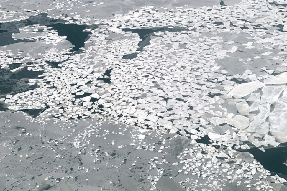 In this Feb. 14, 2019, photo, sheets of ice float in Norton Sound near the Native Village of St. Michael, Alaska, population 400. Transportation in the area is limited to air travel. Image by Wong Maye-E. United States, 2019.