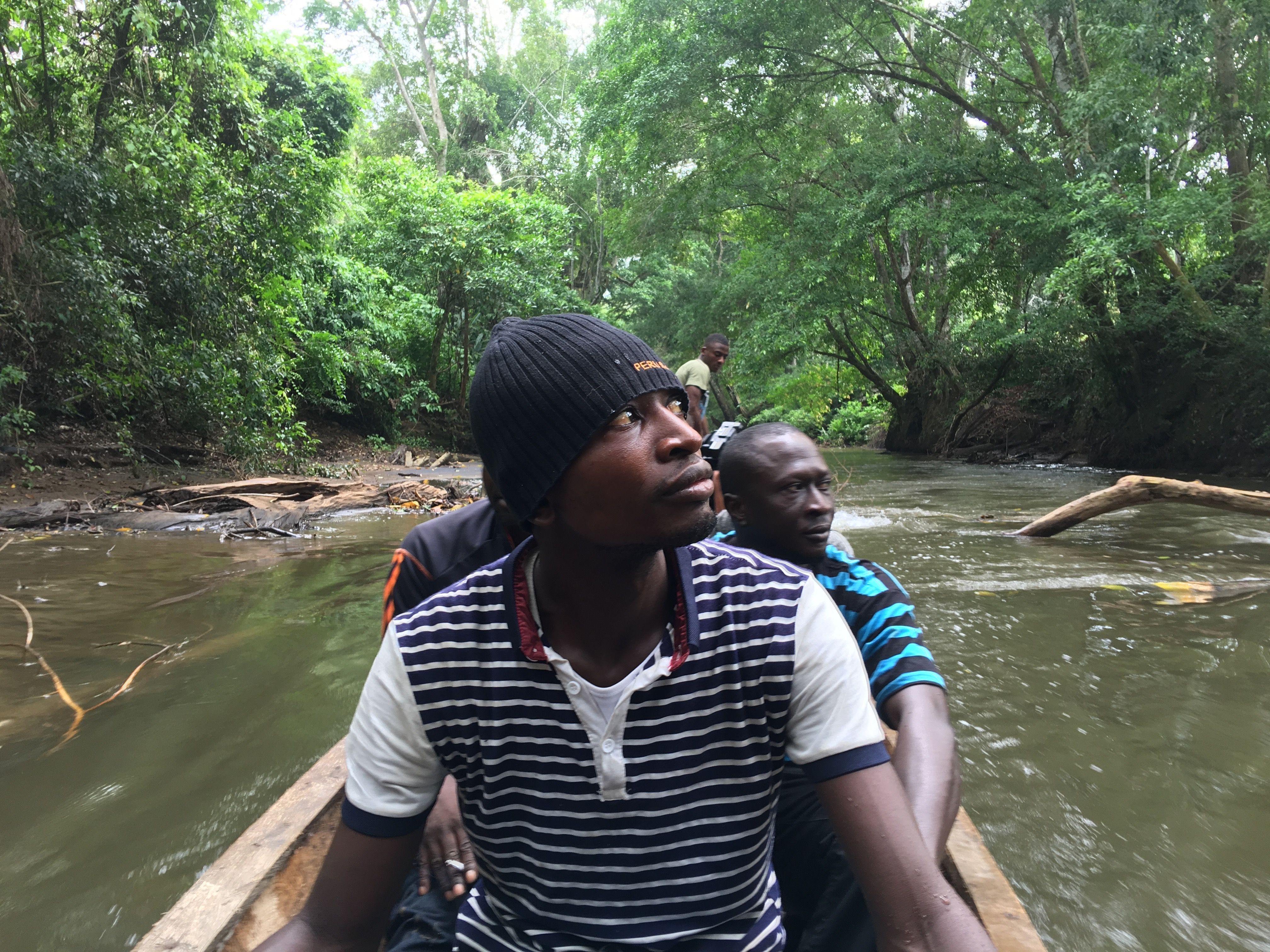 Gambian migrants travel deeper into the Darien Gap by boat. Image by Jason Motlagh. 2016.