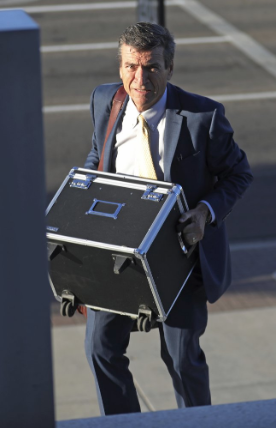 In this Aug. 23, 2019, photo, defense attorney Greg Skordas arrives at federal courthouse during the trial for Aaron Shamo, in Salt Lake City. Shamo was convicted of running a multimillion-dollar fentanyl trafficking empire from his computer with a few friends. Image by Rick Bowmer. United States, 2019.