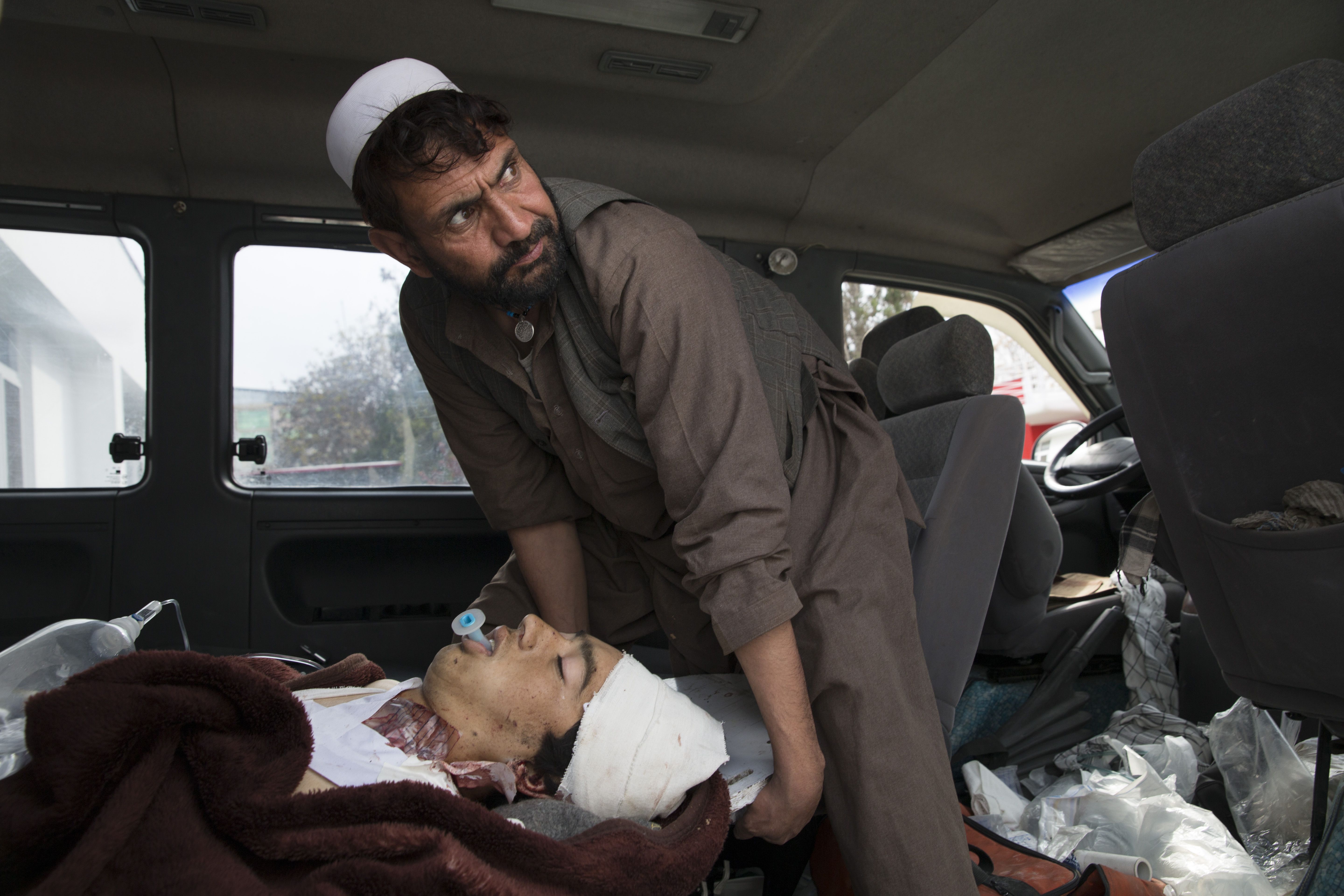 An ambulance transports a patient from Ghazni. Image by Paula Bronstein. Afghanistan, 2015. 