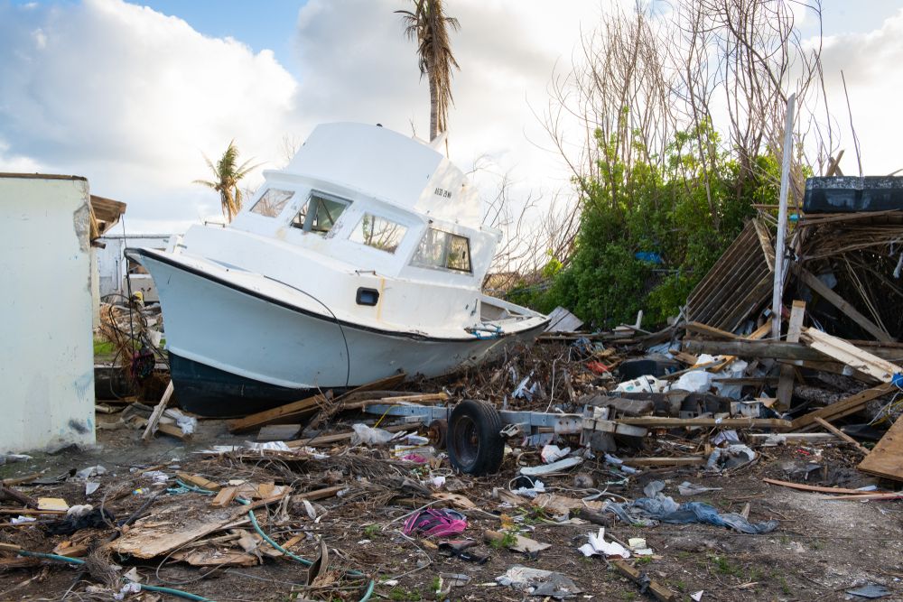 Damage and debris on Great Abaco Island in the aftermath of Hurricane Dorian. Image by Paul Dempsey / Shutterstock. Bahamas, 2019. 