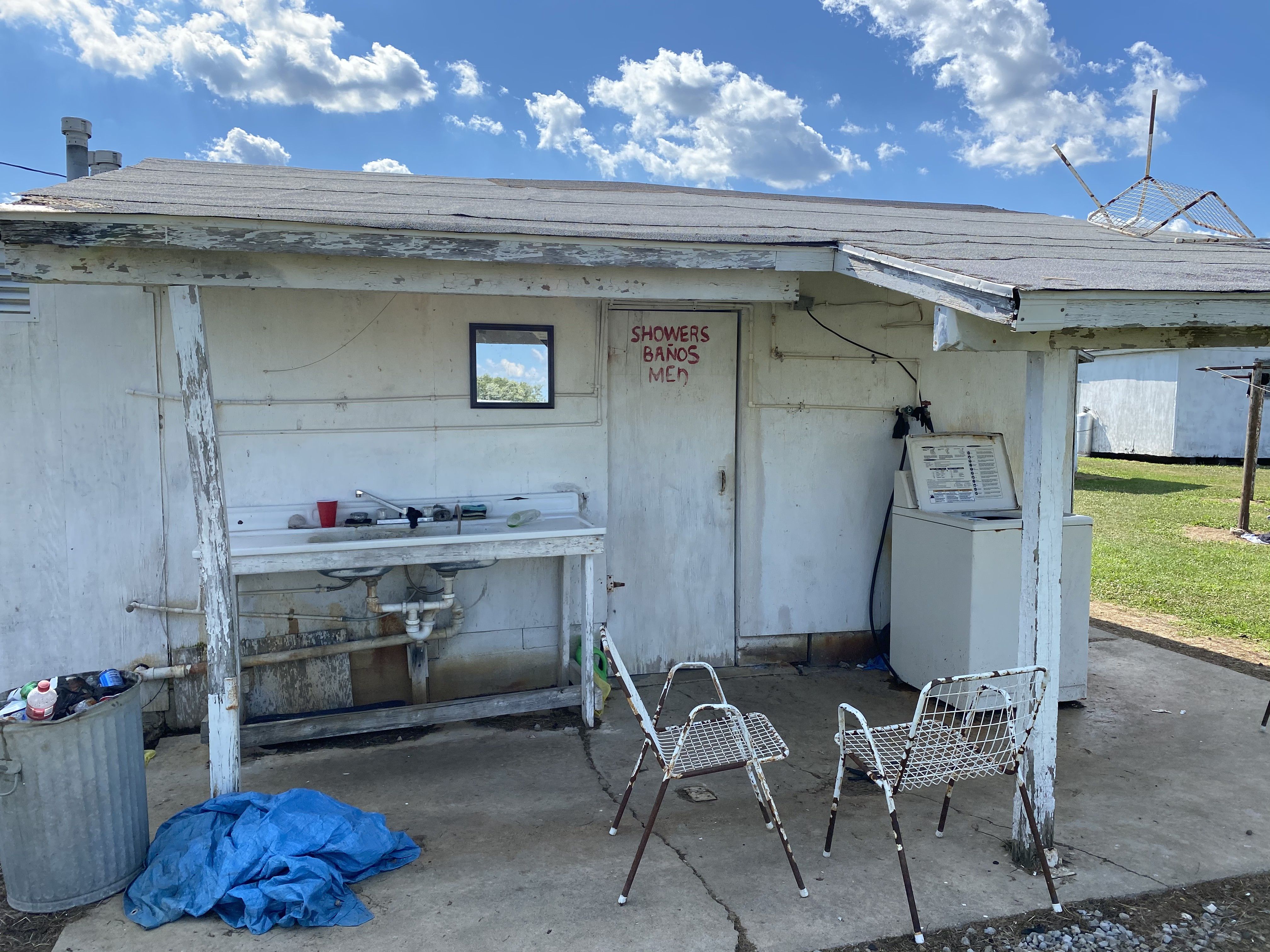 An image of the bathrooms farmworkers share in a migrant camp in Delta, Ohio. Image by Areeba Shah. United States, 2020.